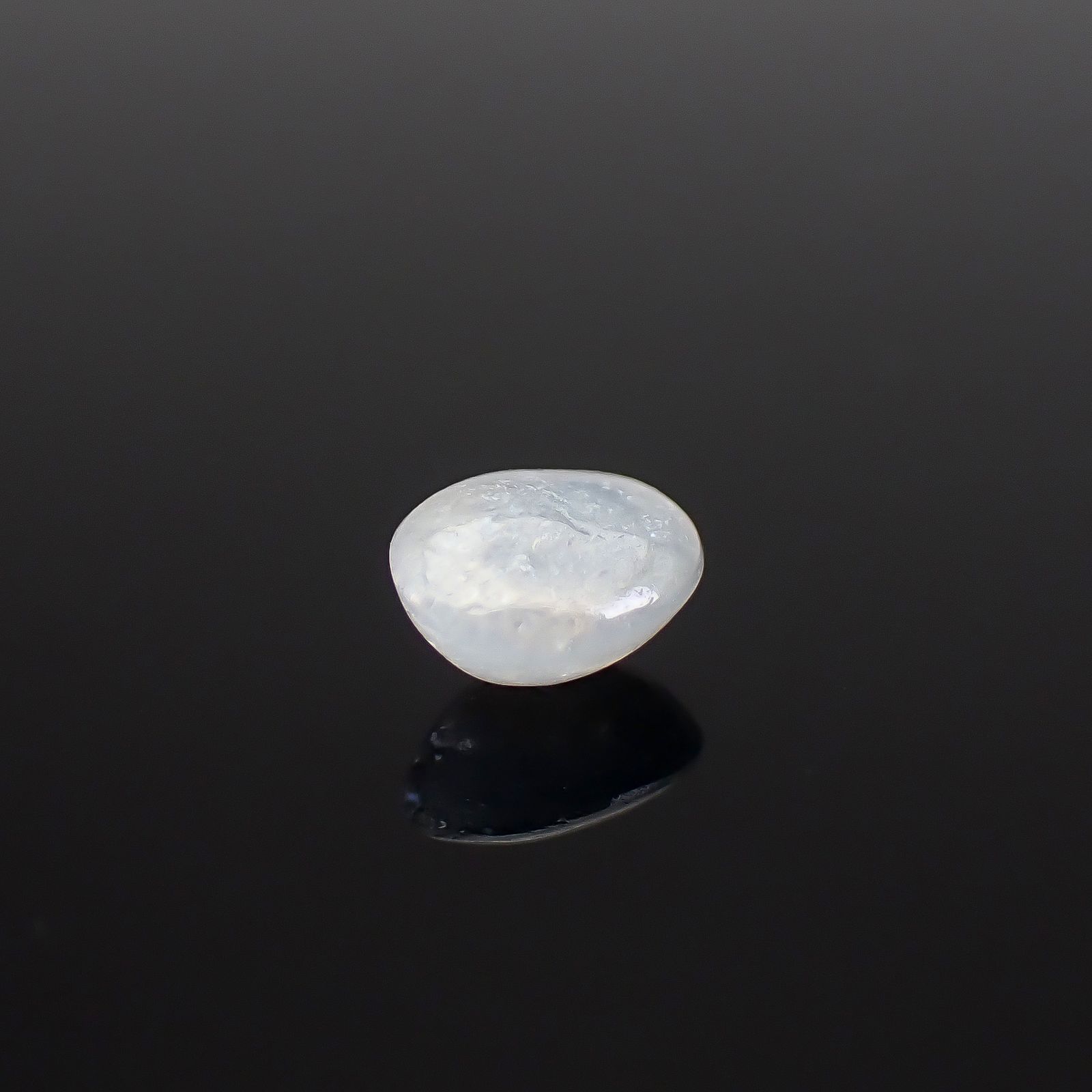 ジルコンキャッツアイ ビルマ産 0.73ct / 5.4x4.3mm前後 [260832880]