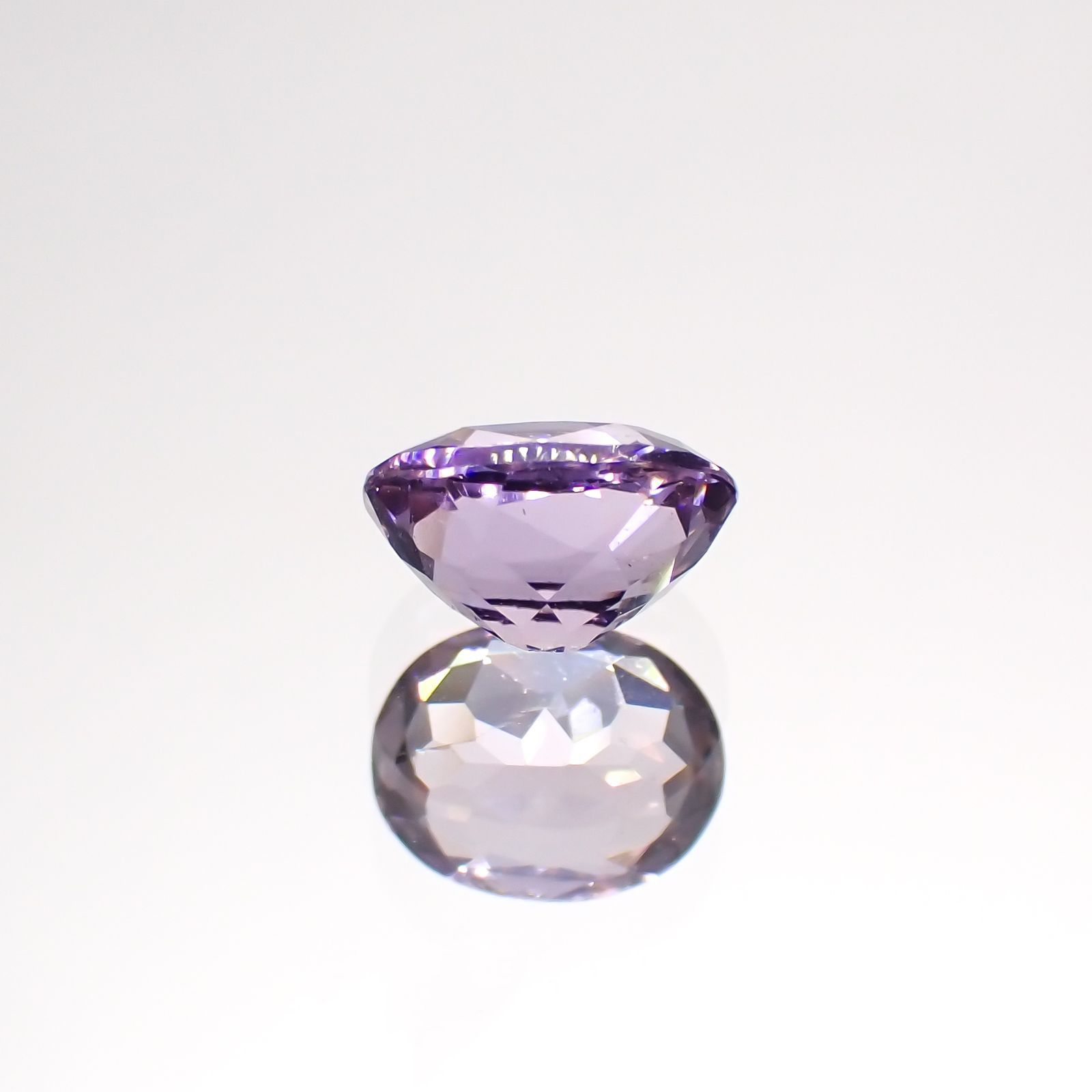 マリアライト フルオレッセンス(宝石名パープル・スキャポライト)スリランカ産 0.73ct 識別済[220114878]6.5x5.1mm前後