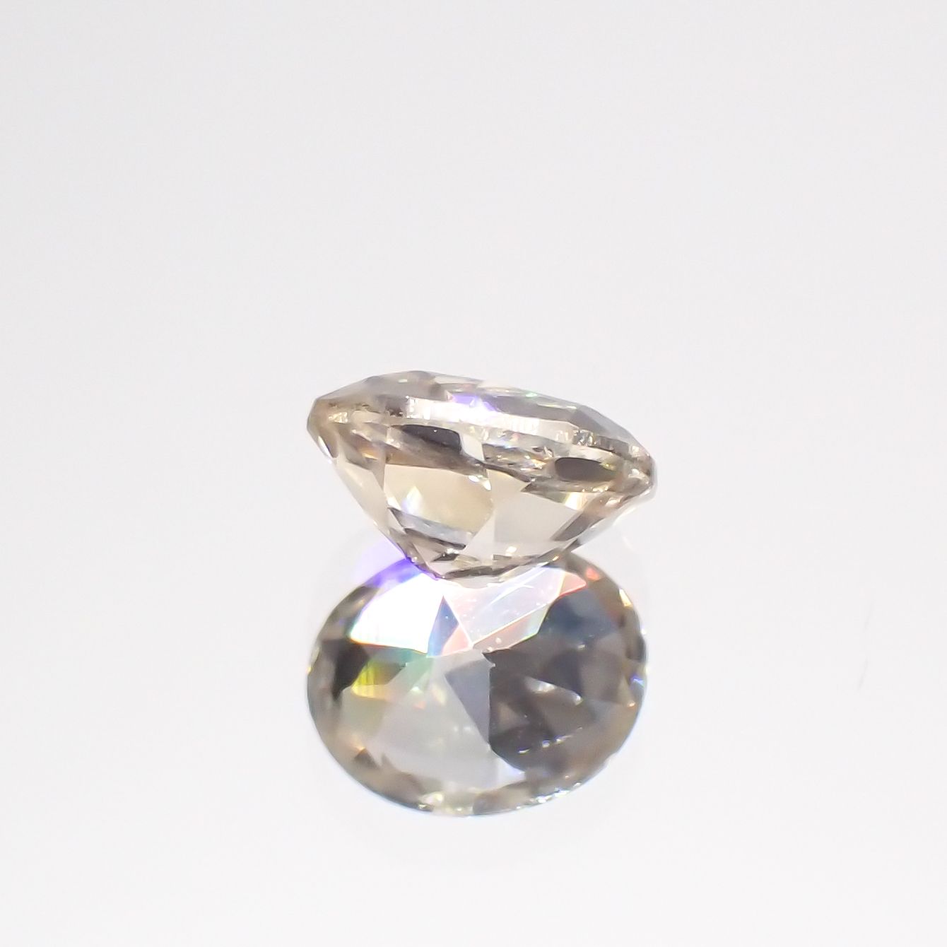 シャンパンカラージルコン(宝石名ジルコン)スリランカ/カンボジア産 0.59ct 識別済[230722984]5.2x4.1mm前後