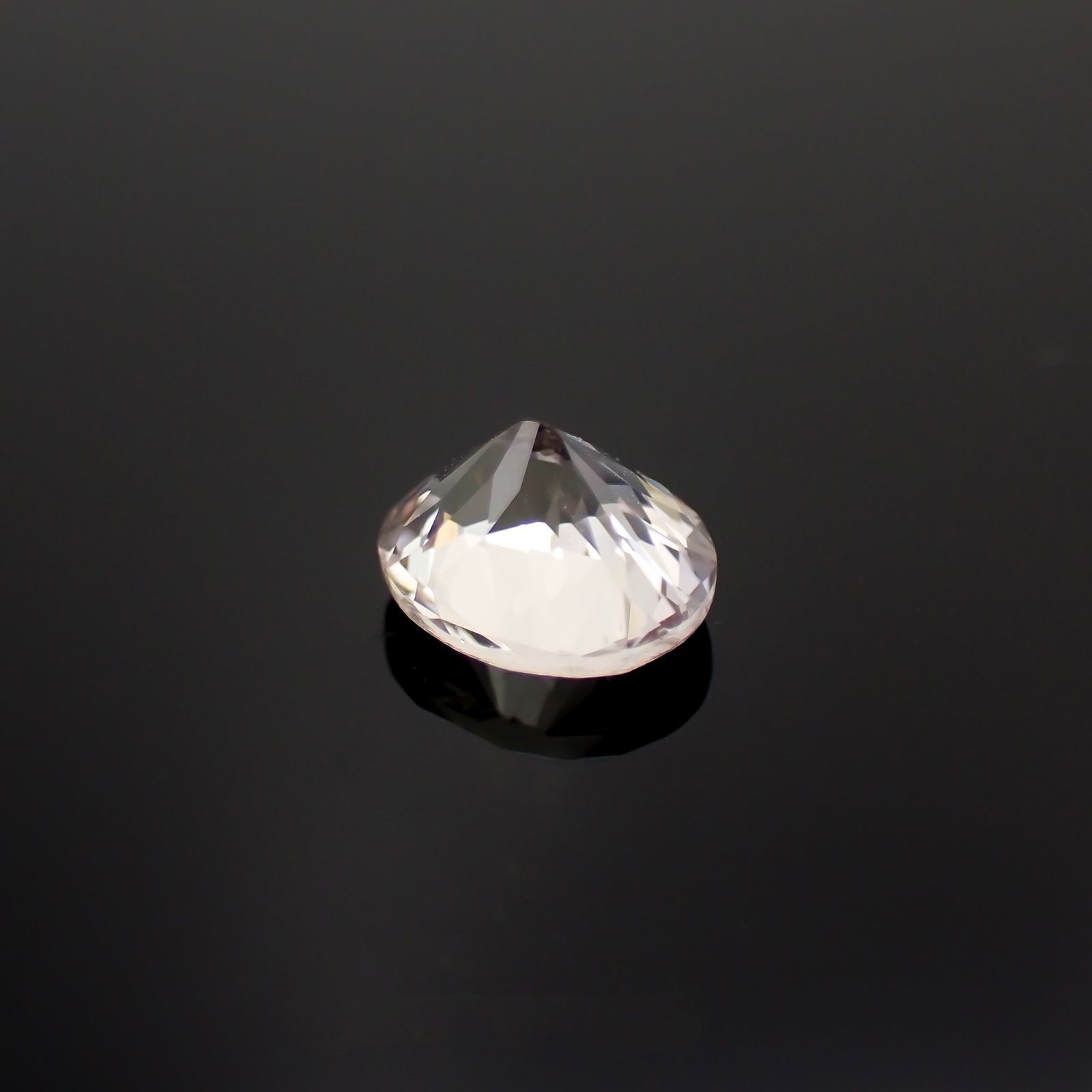 ゾイサイト 非加熱(宝石名ゾイサイト)タンザニア産 ソ付(彩珠) 0.911ct / 6.4x5.5mm前後 [221018876]