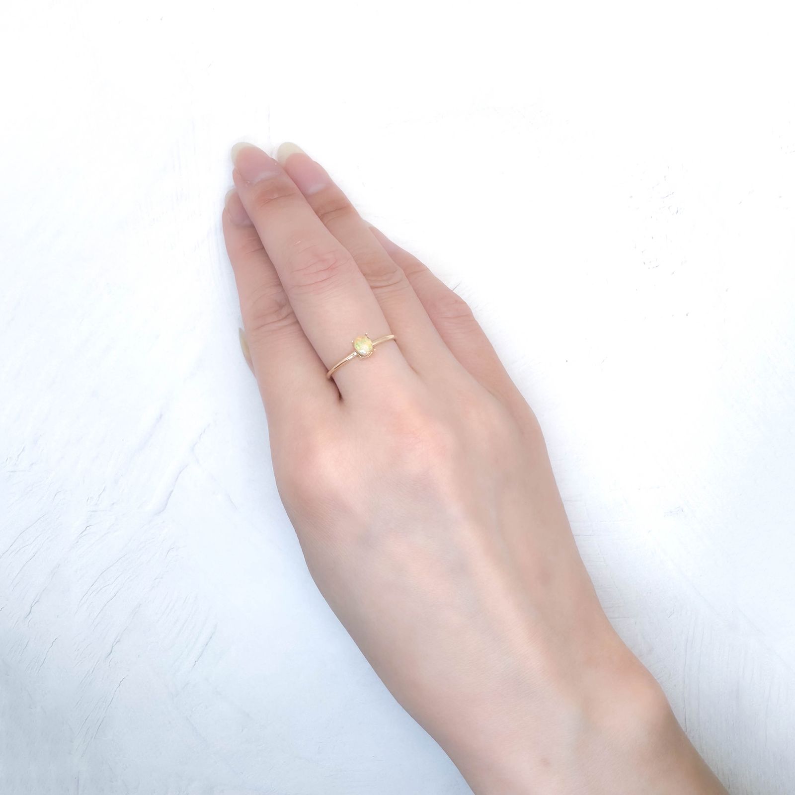 ウッドオパール オーストラリア産 0.32ct / 4.7x3.9mm前後 [251031197]