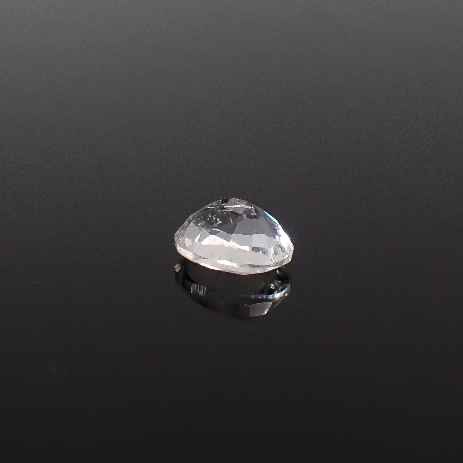 テネブレッセンススキャポライト アフガニスタン産 0.25ct / 4.8x3.5mm前後 [260432042]