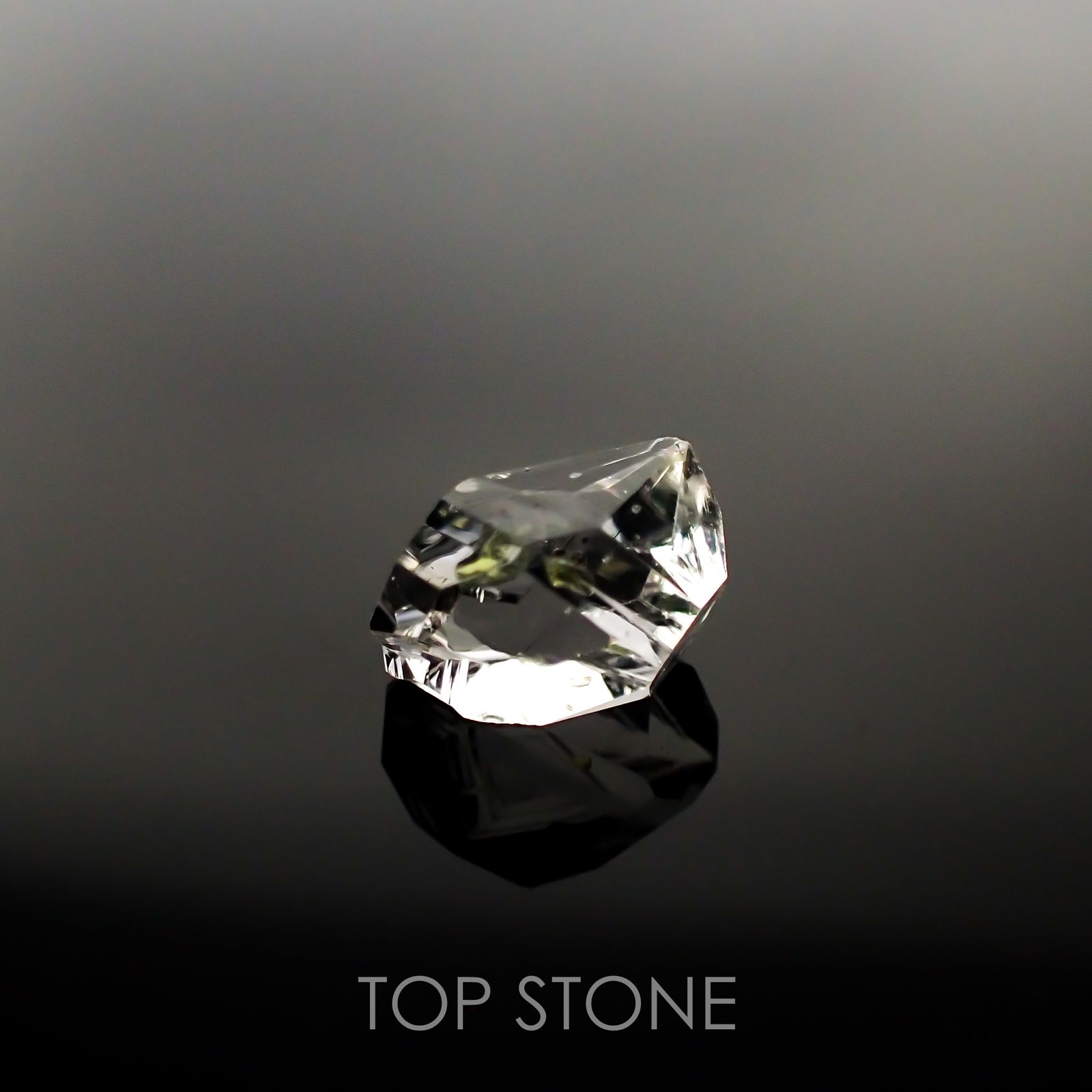 オイルインクォーツ パキスタン産 ルース 4.14ct[210911444]11.6×9.4mm前後