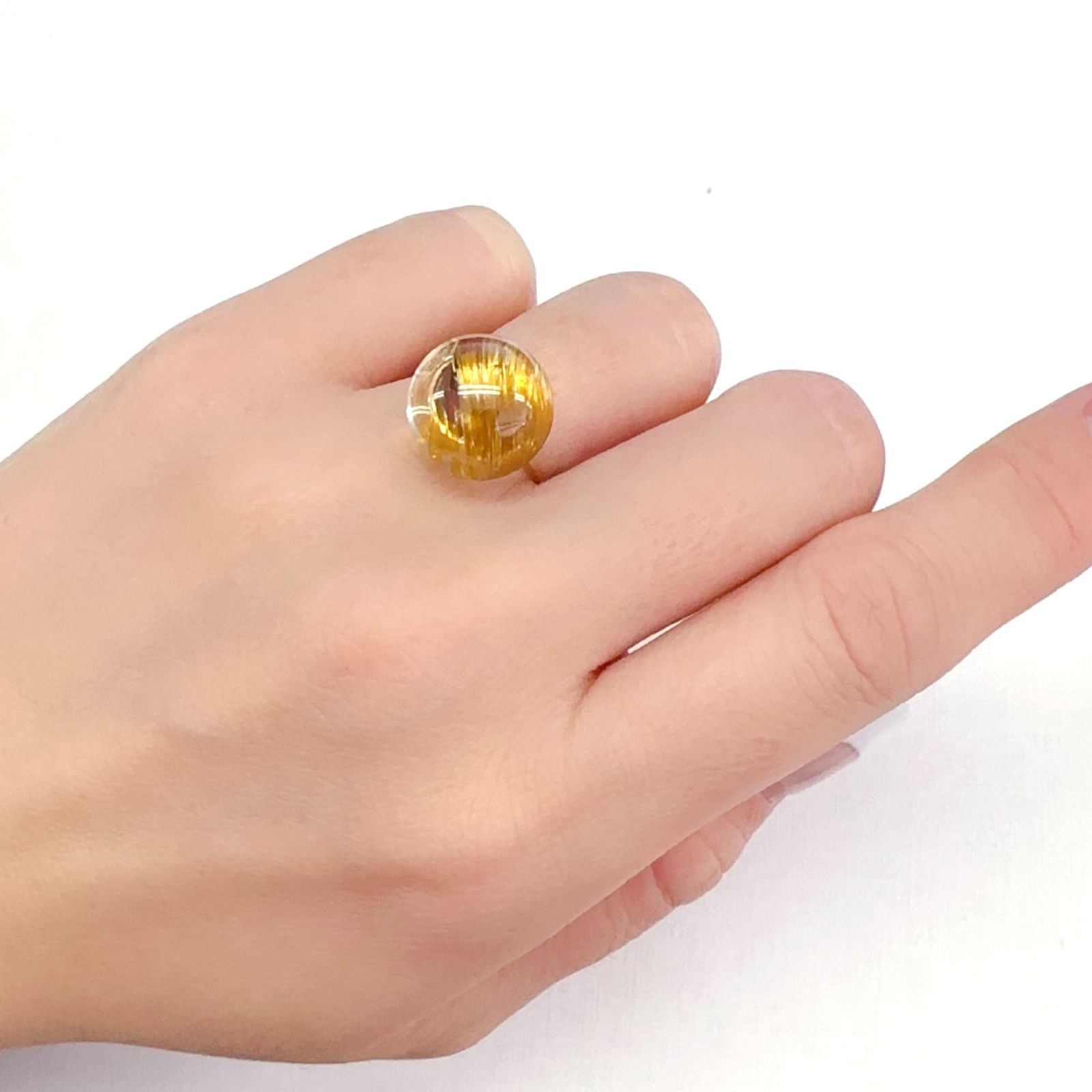 ルチルクォーツキャッツアイ ブラジル産 10.77ct[240125644]13.2x13.2mm前後