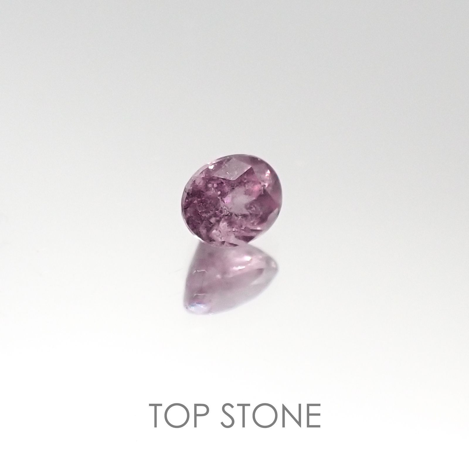 カラーチェンジマラヤガーネット (パイロープ/スペサタイト) タンザニア産 ルース 0.32ct[20085135]4×3.3mm前後