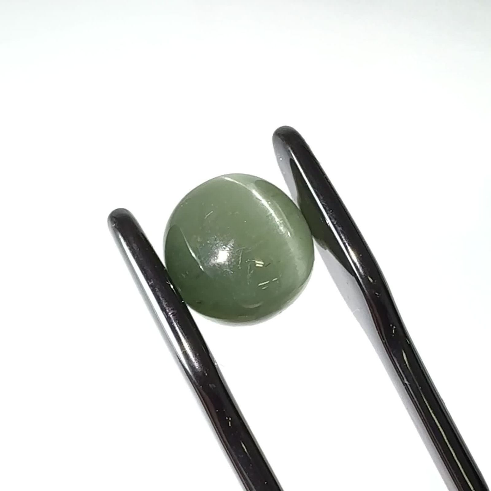 グリーンアパタイトキャッツアイ ブラジル産 4.47ct / 9.2x9.2mm前後