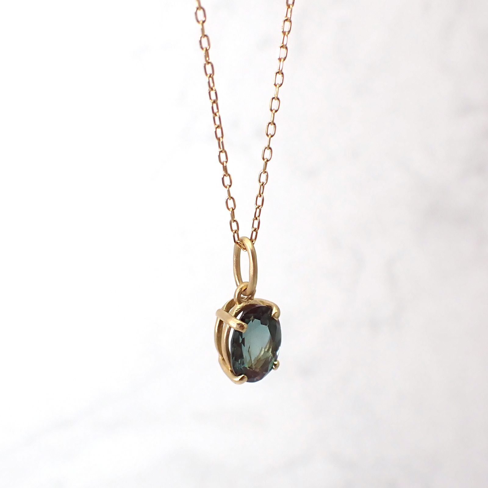 ペンダント空枠：石留め▶カラーチェンジアンデシン（お客様製作例）