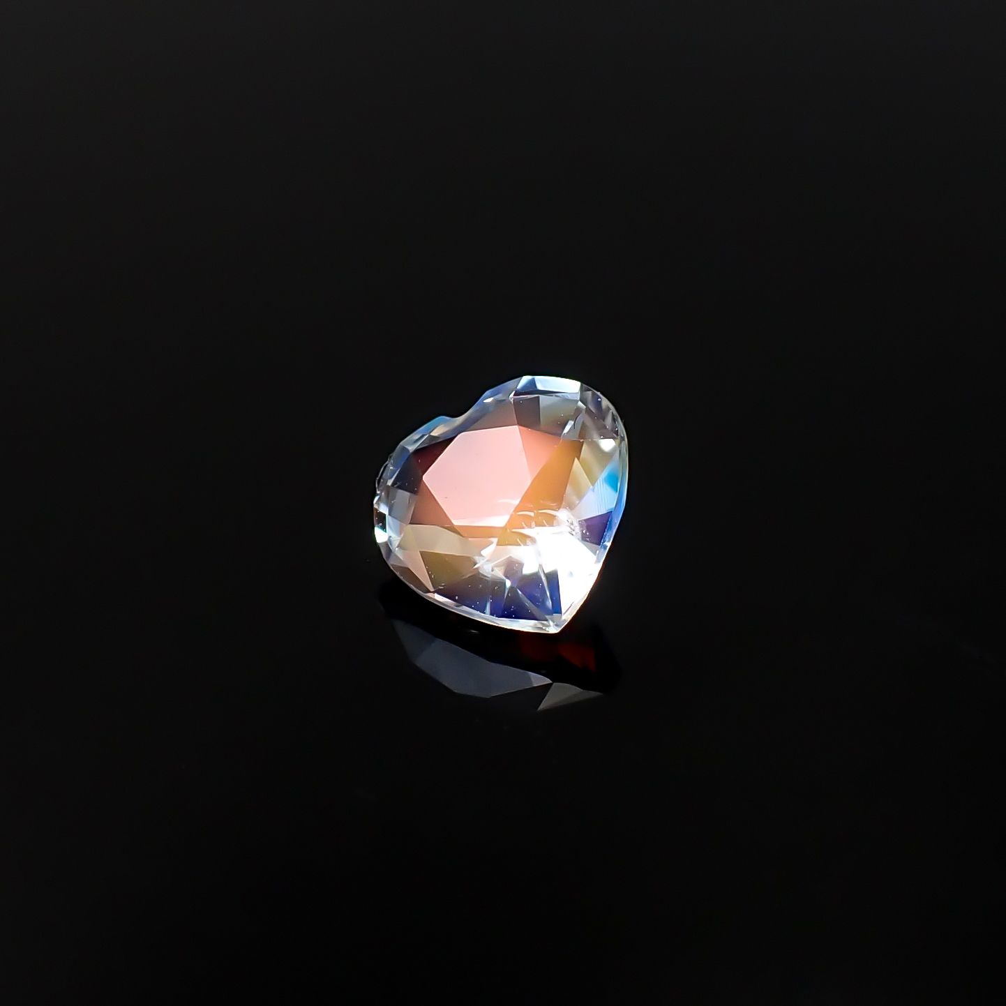 レインボームーンストーン マダガスカル産 0.64ct / 5.8x5.9mm前後 [260632378]