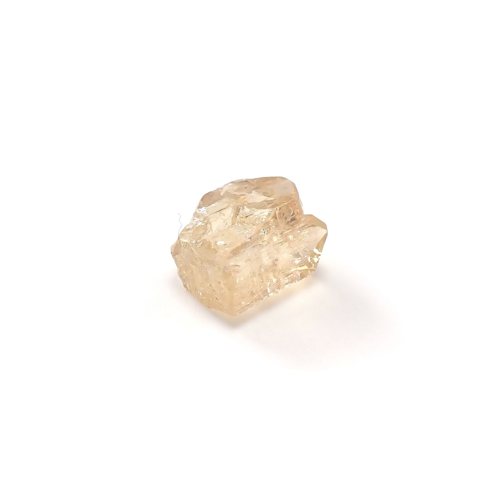 インペリアルトパーズ 原石 ザンビア産 8.26ct / 12.3x10.8mm前後 [250730938]