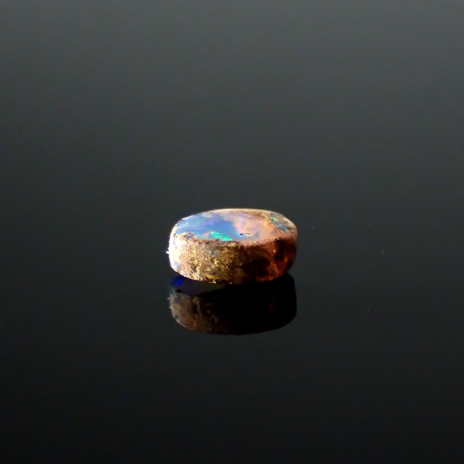 ウッドオパール オーストラリア産 0.24ct / 4.8x3.6mm前後 [251031199]