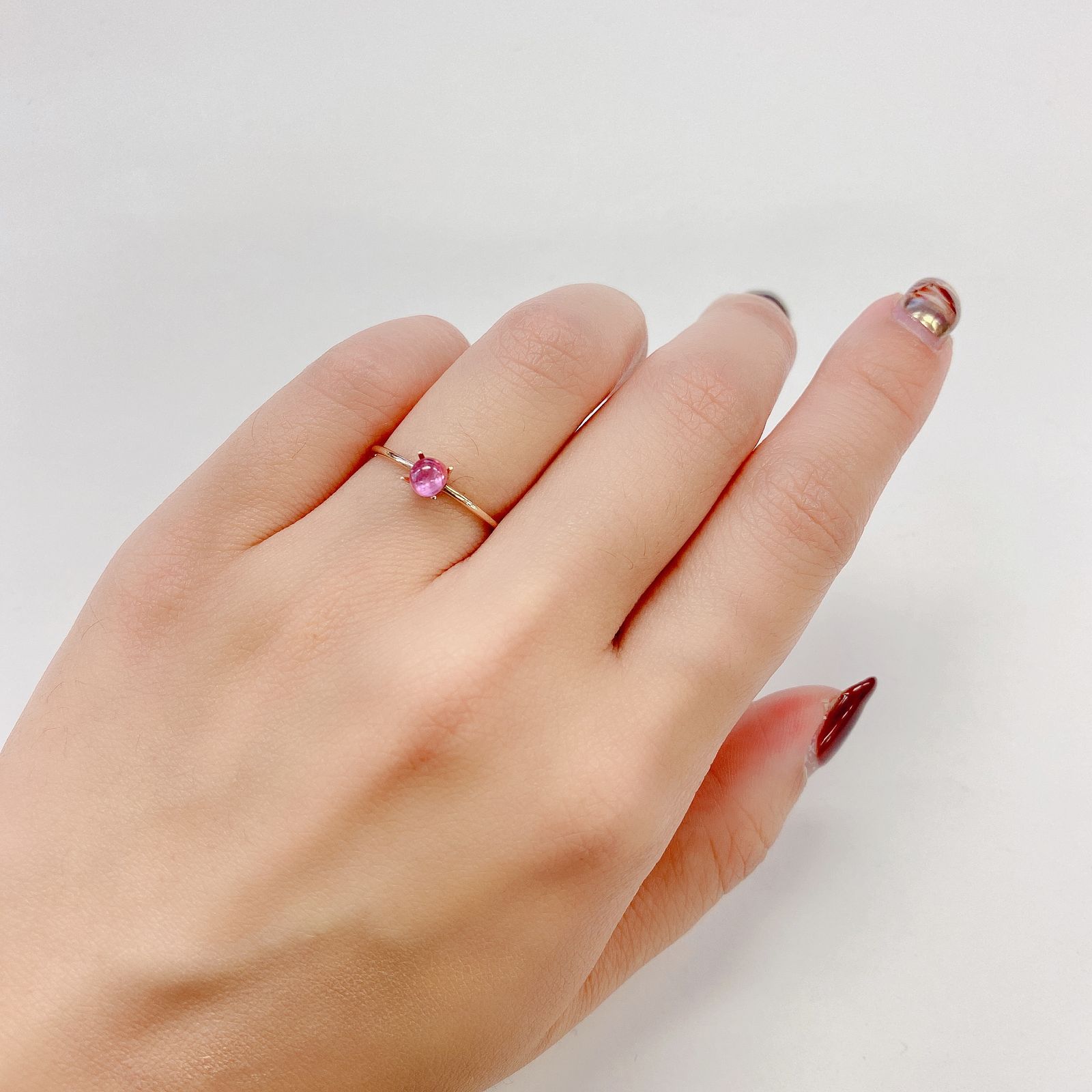ペツォッタイトキャッツアイ(ラズベリル)(宝石名ペツォッタイト・キャッツアイ) マダガスカル産 0.438ct ソ付(彩珠)[210711643]4.3×4.2mm前後