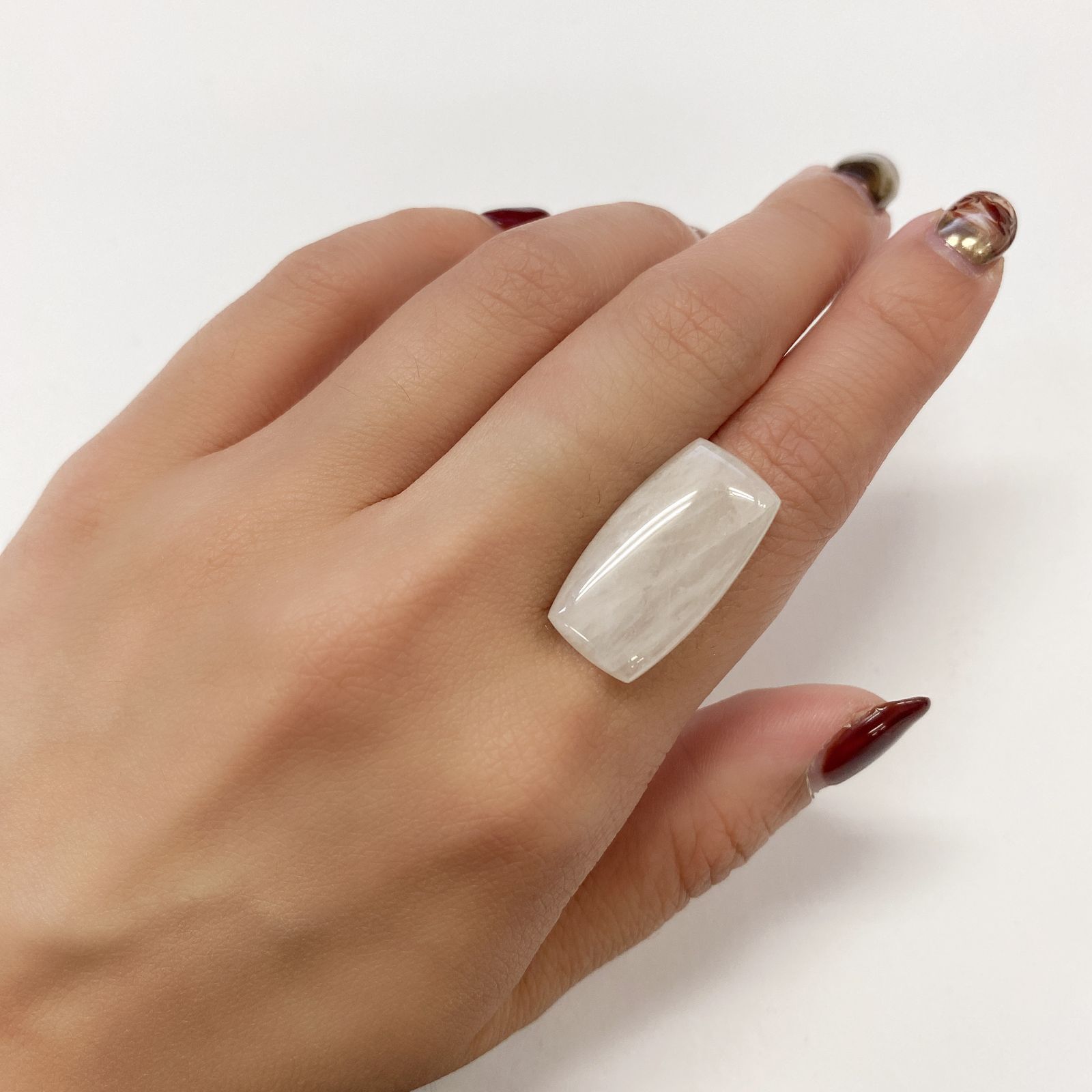 フェナカイト(宝石名ブラウン・フェナカイト)ブラジル産 13.971ct ソ付(彩珠)[231023797]24.8x13mm前後