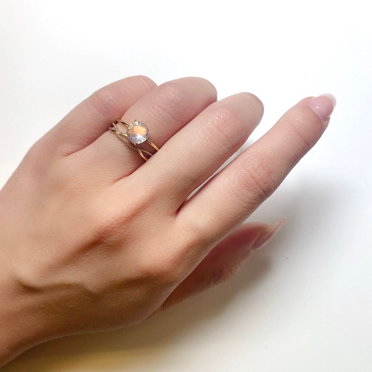 レインボームーンストーン(アンデシンラブラドライト) マダガスカル産 ルース 0.96ct[210611258]6.7×6.6mm前後