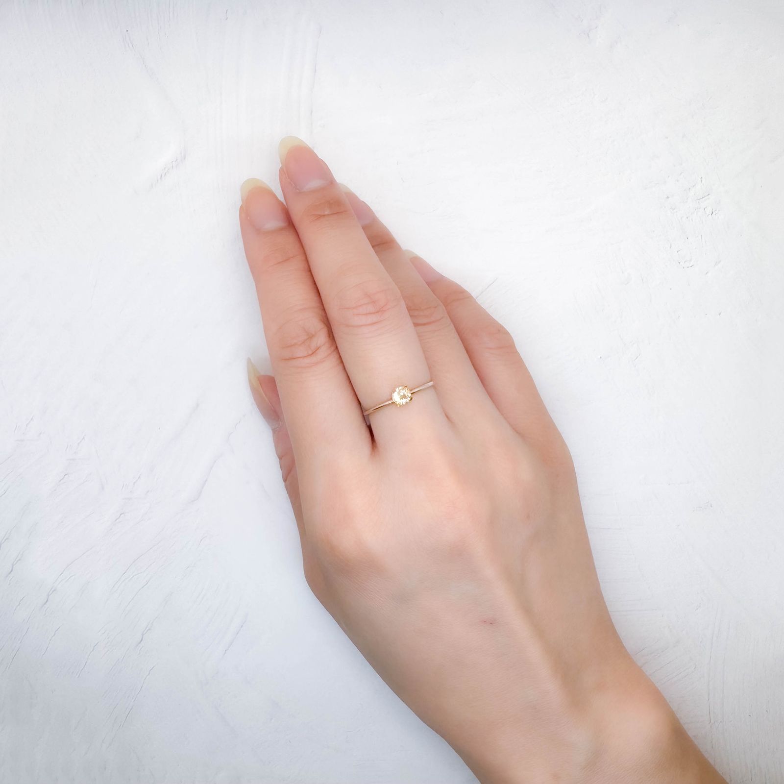 インペリアルトパーズ(宝石名トパーズ)ブラジル産 0.30ct / 4.1x4.1mm前後 [250630499]