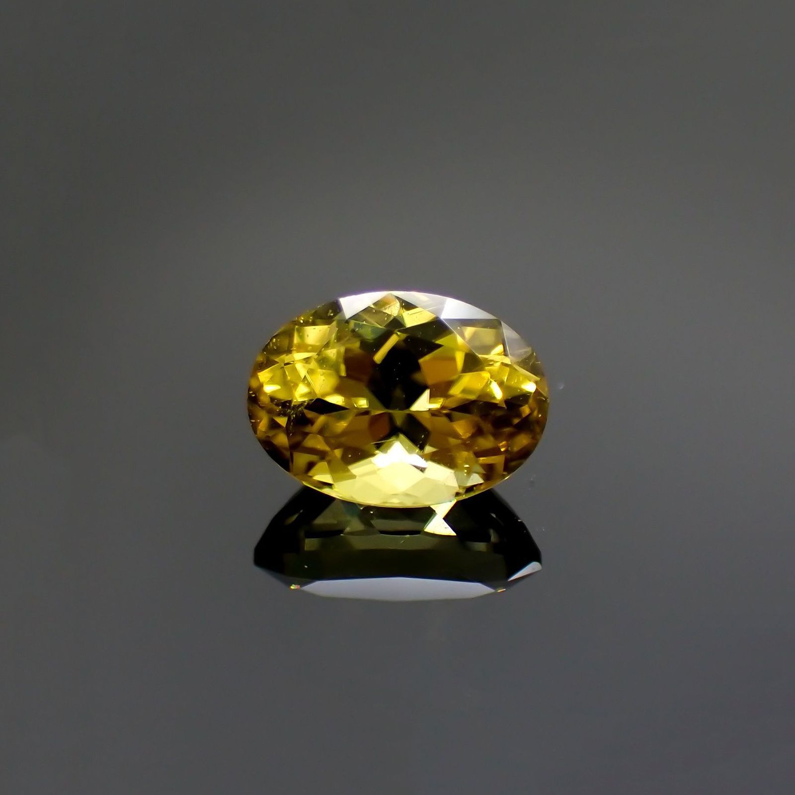 カナリートルマリン(宝石名イエロー・トルマリン)ザンビア・カナリー鉱山産 1.217ct ソ付(彩珠)[250522202]7.7x5.5mm前後