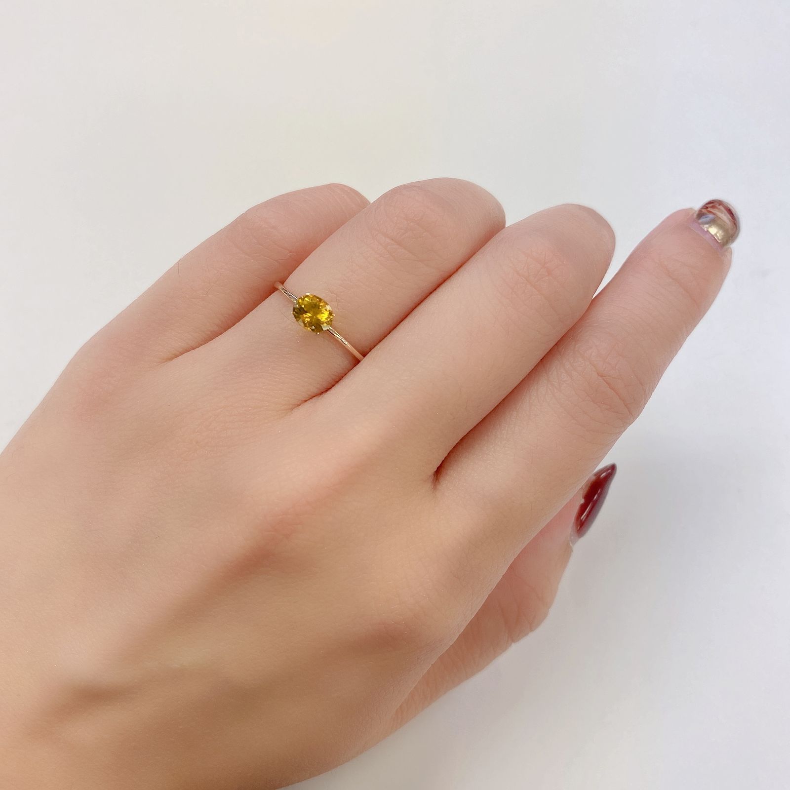 クリノヒューマイト(宝石名クリノヒューマイト) パキスタン産 0.576ct ソ付(CGL)[21059599]5.5×4.5mm前後
