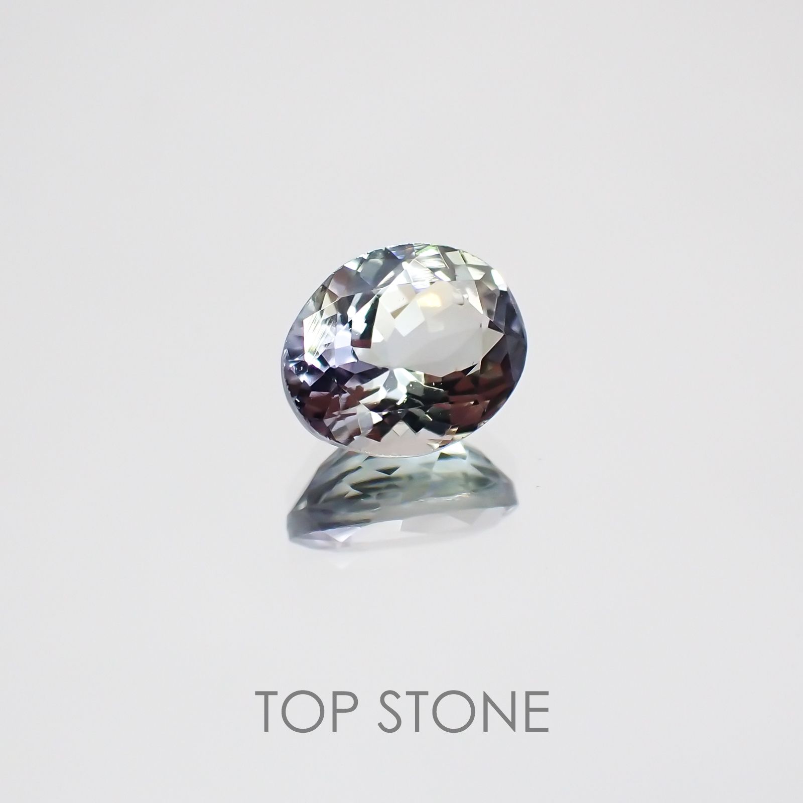 パーティカラータンザナイト(宝石名パーティカラード・ゾイサイト) タンザニア産 1.382ct ソ付(彩珠)[20074303]7.5×6.2mm前後