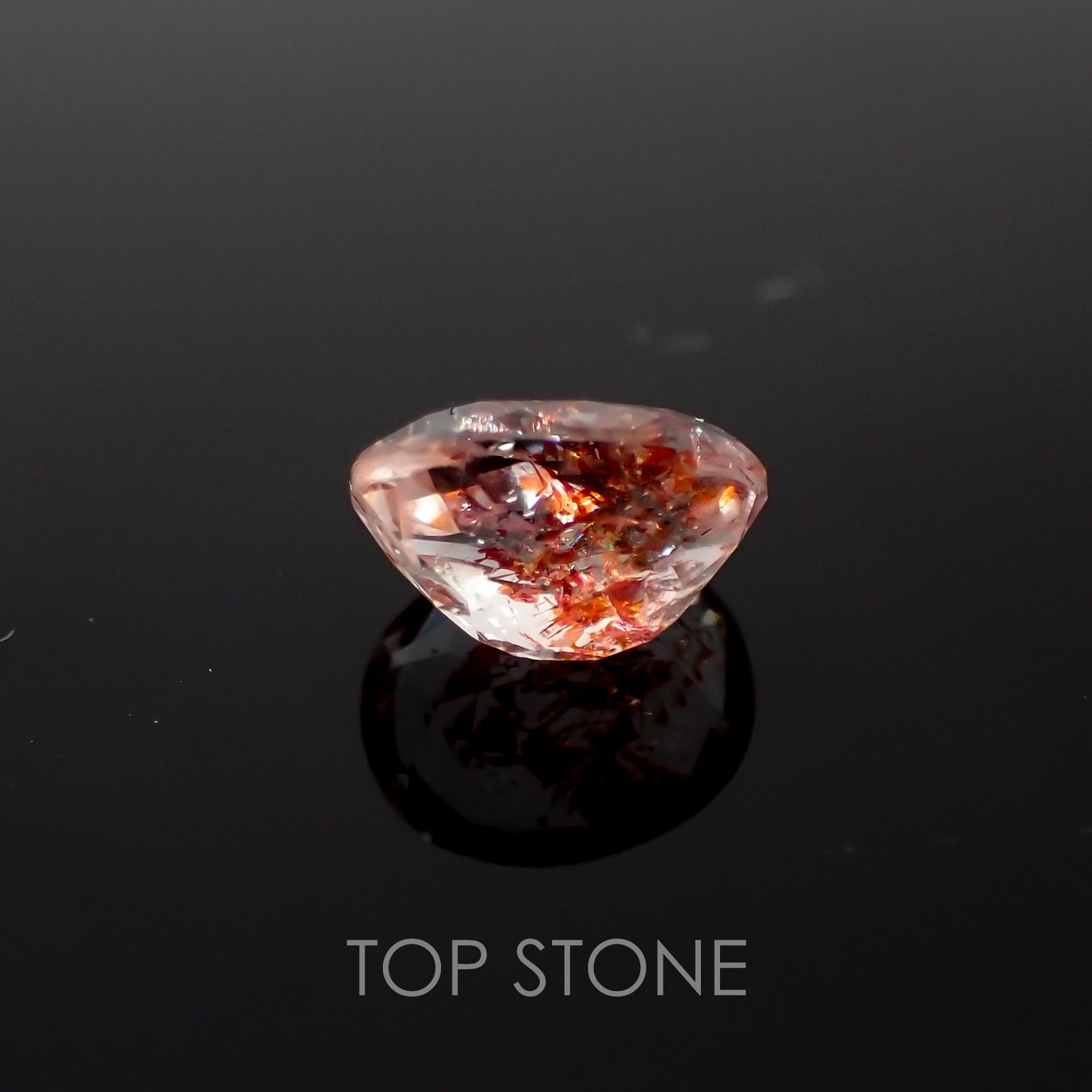 ファイヤークォーツ ナイジェリア産 ルース 1.41ct[210410207]7.9×6.5mm前後