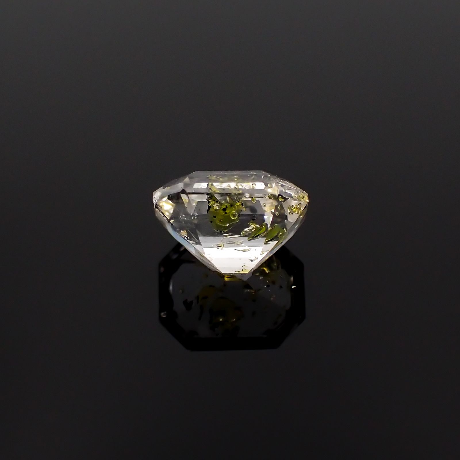 ◇オクタゴンカット◇オイルインクォーツ パキスタン産 0.65ct [230522094]5.9x4.7mm前後