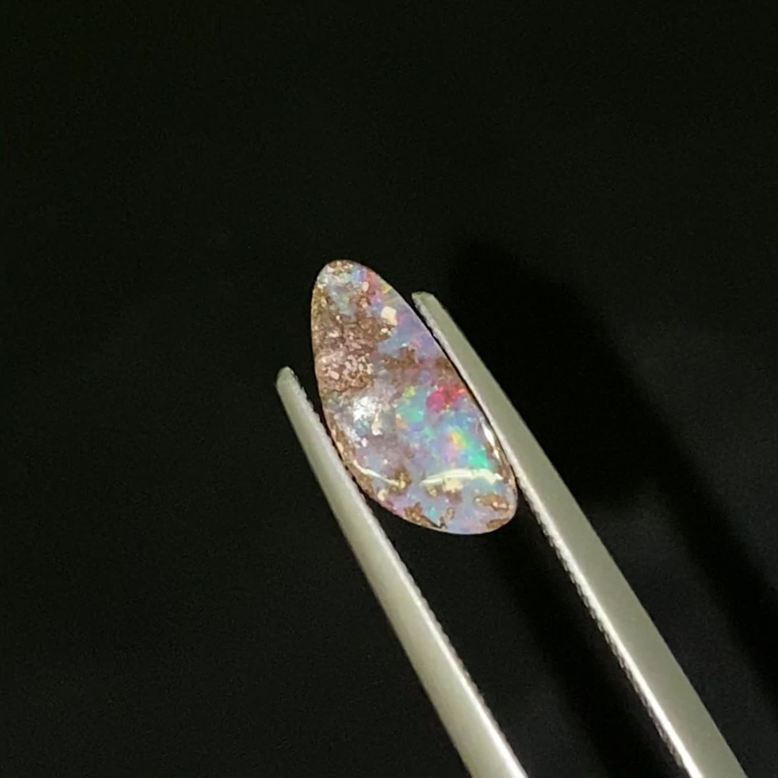 ボルダーオパール 原石磨き オーストラリア産 1.29ct / 11.7x5.1mm前後