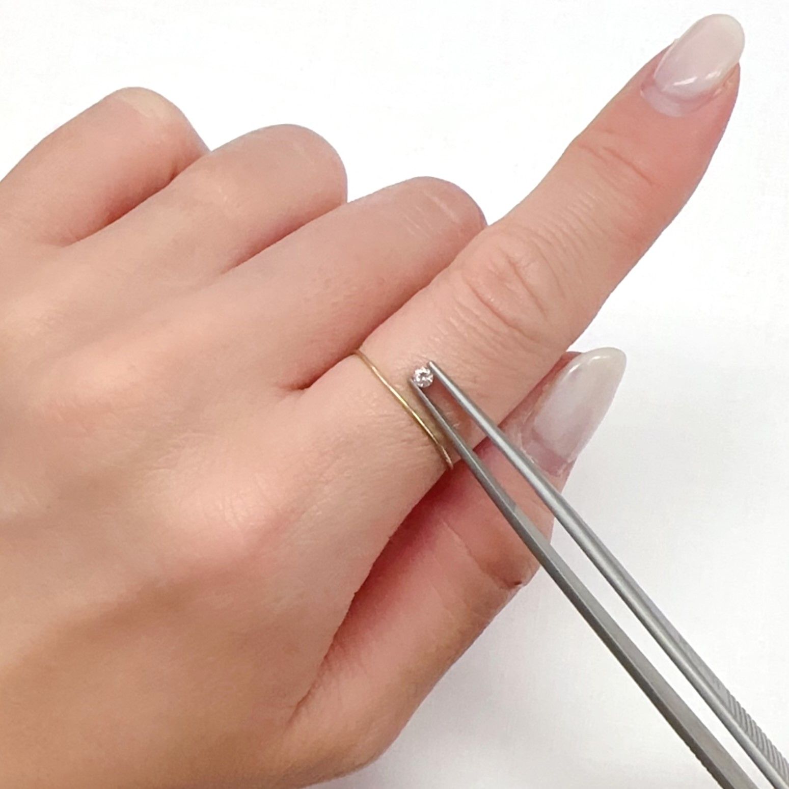 ピンクダイヤモンド(宝石名ダイアモンド SI-1/FANCY LIGHT ORANGY PINK) 0.046ct ソ付(CGL)[240326637]2.29x2.35mm前後