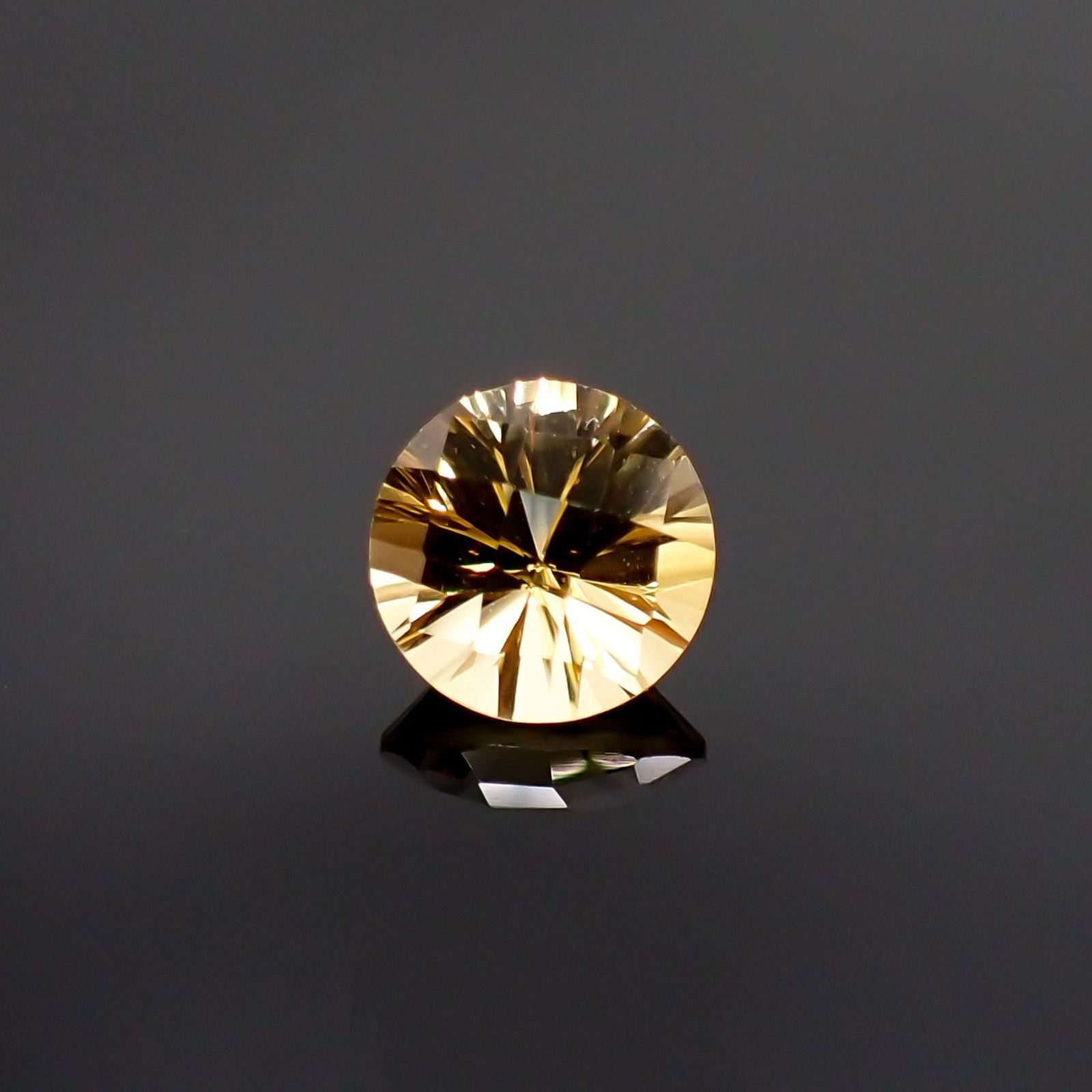 ◇チェッカーコンケーブカット◇シトリン(宝石名シトリン) ブラジル産 識別済 1.13ct / 7×7mm前後 [251013022]