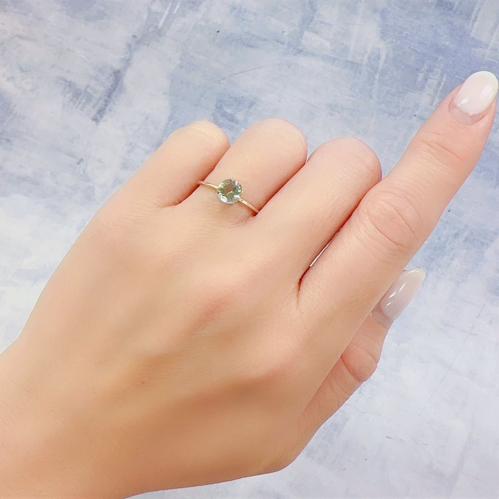 バイカラーオレゴンサンストーン アメリカ・オレゴン州産 0.62ct[230220681]5.9x5.9mm前後