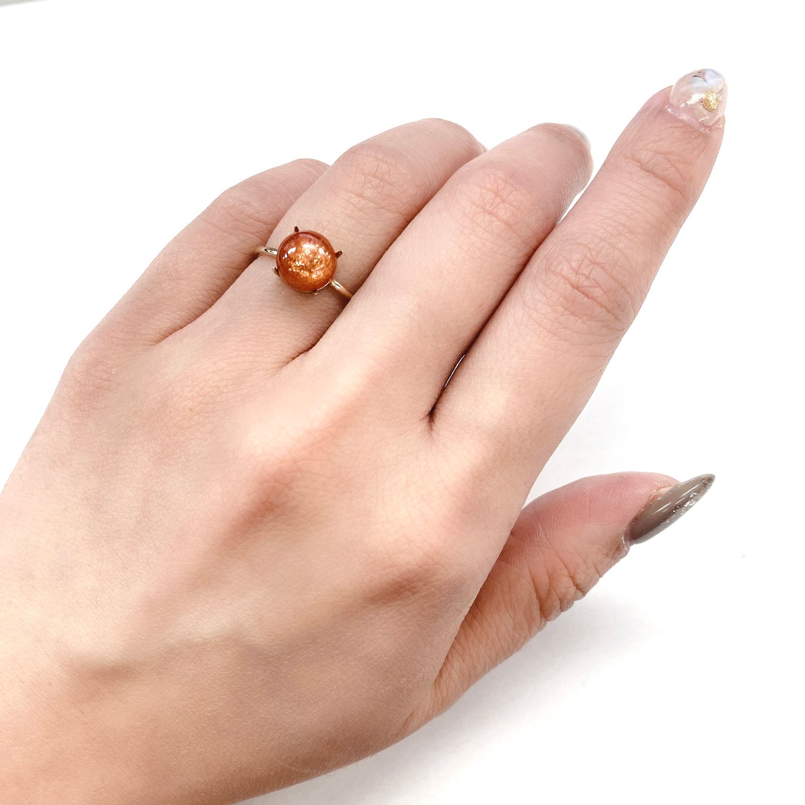 イリュージョンサンストーン タンザニア産 ルース 2.57ct[210510866]8.2×8.1mm前後