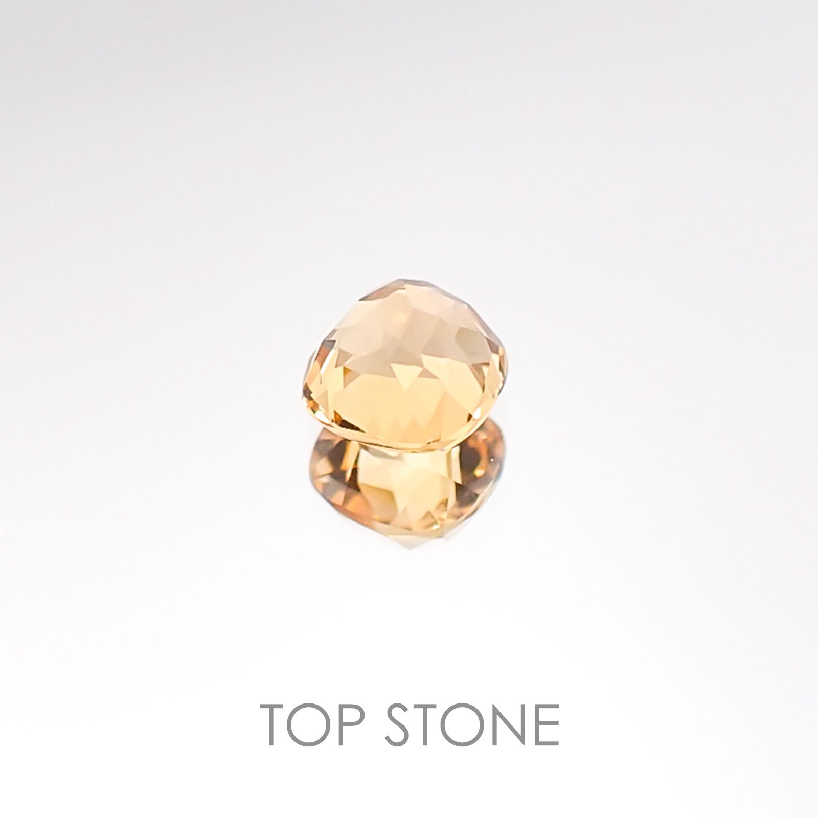 インペリアルトパーズ ブラジル産 ルース 0.61ct[20106511]4.7×4.6mm前後