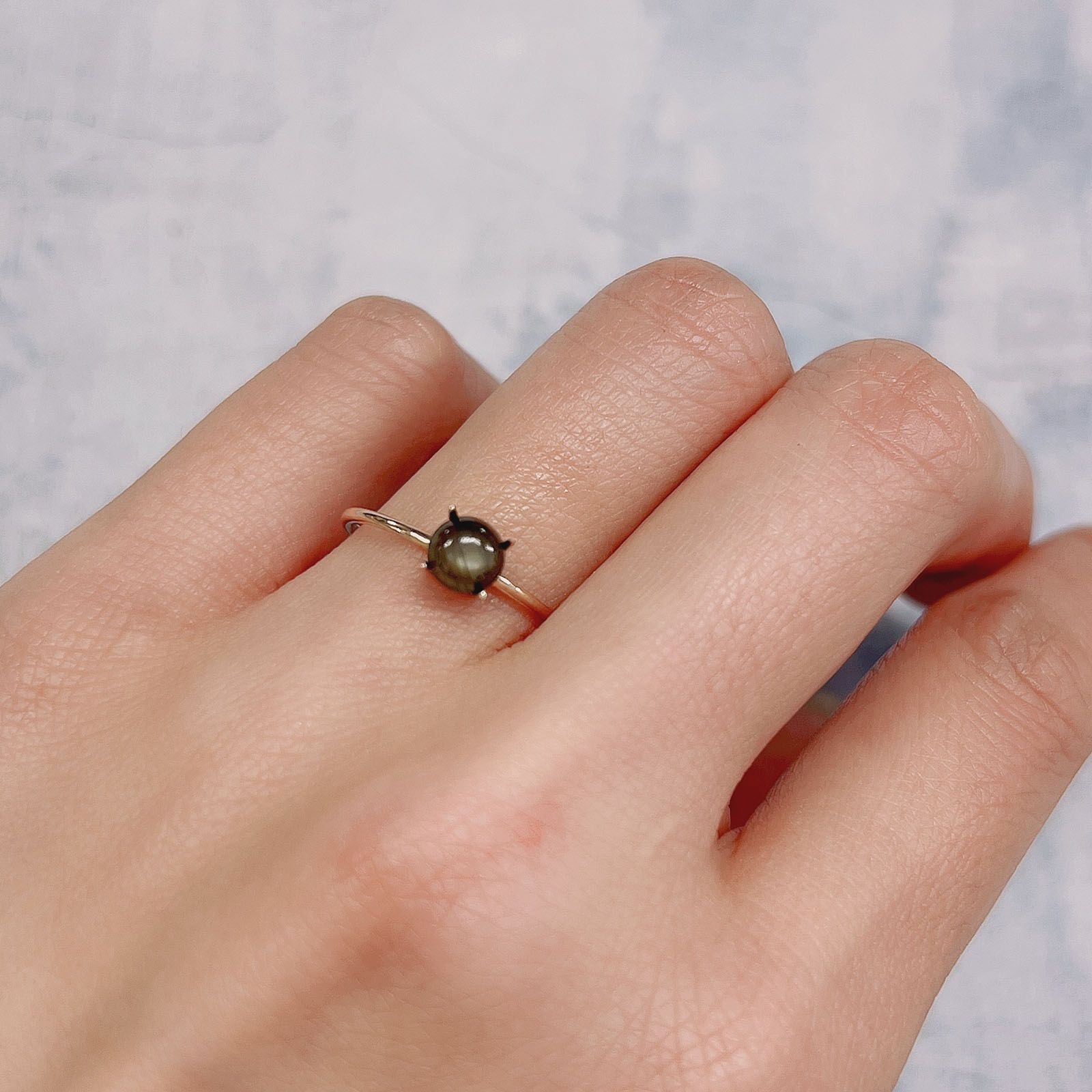 ゴールドシーンスターサファイア(宝石名シーン・スター・サファイア) ケニア産 0.69ct 識別済[19111589]5×5mm前後