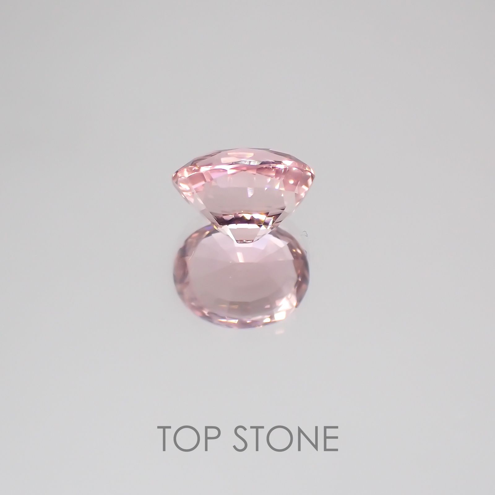 ピンクトルマリン パパラチャカラー(宝石名ピンク・トルマリン) ルワンダ産 1.590ct ソ付(彩珠)[21039972]7.9×6.4mm前後