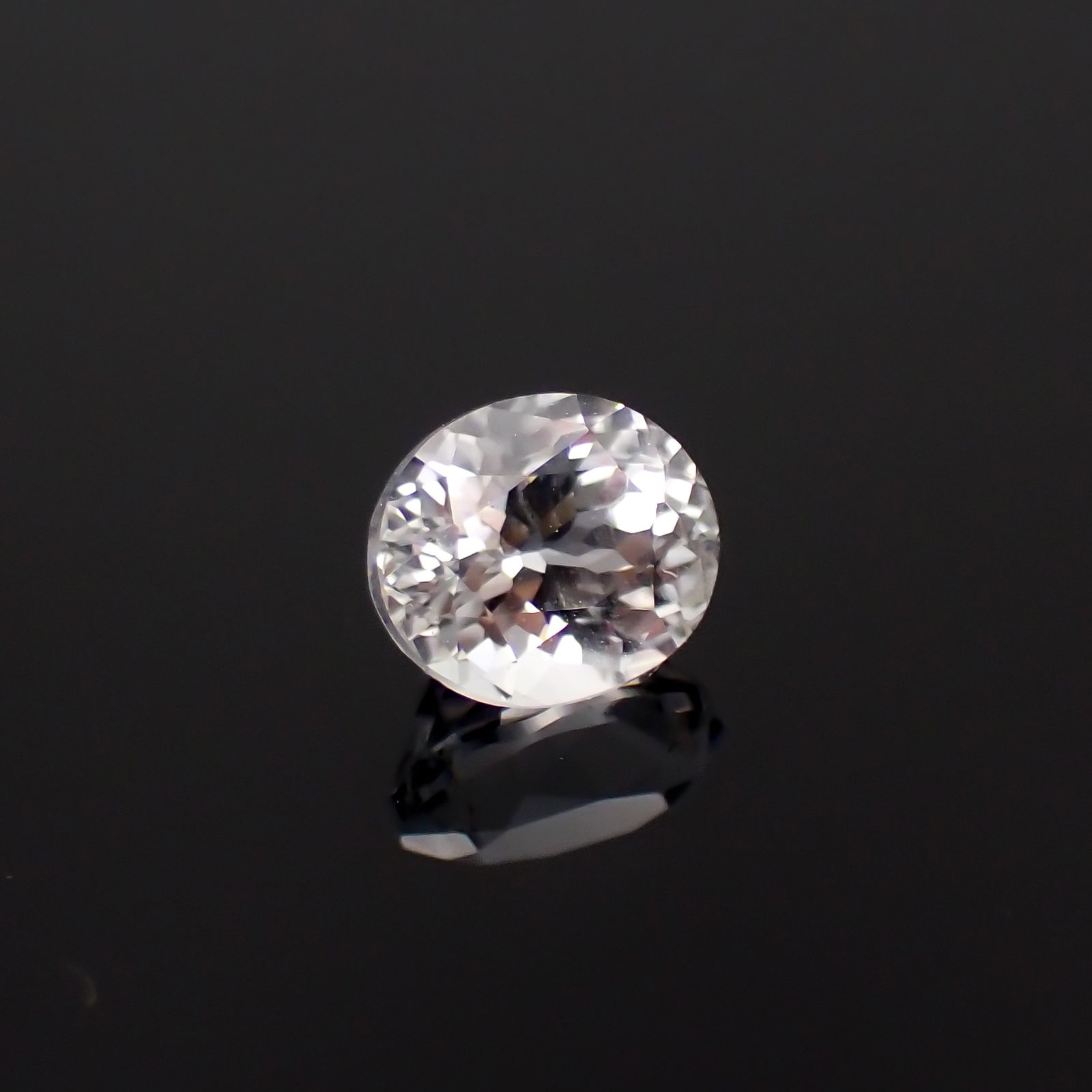 フェナカイト(宝石名フェナカイト)ブラジル産 0.85ct 識別済[230923398]6x5.2mm前後