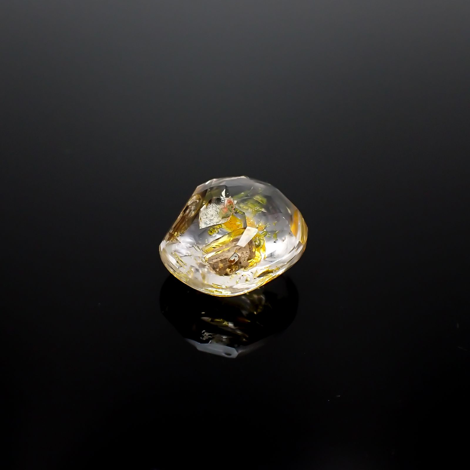 オイルインクォーツ パキスタン産 8.08ct[231224521]13.3x11.7mm前後