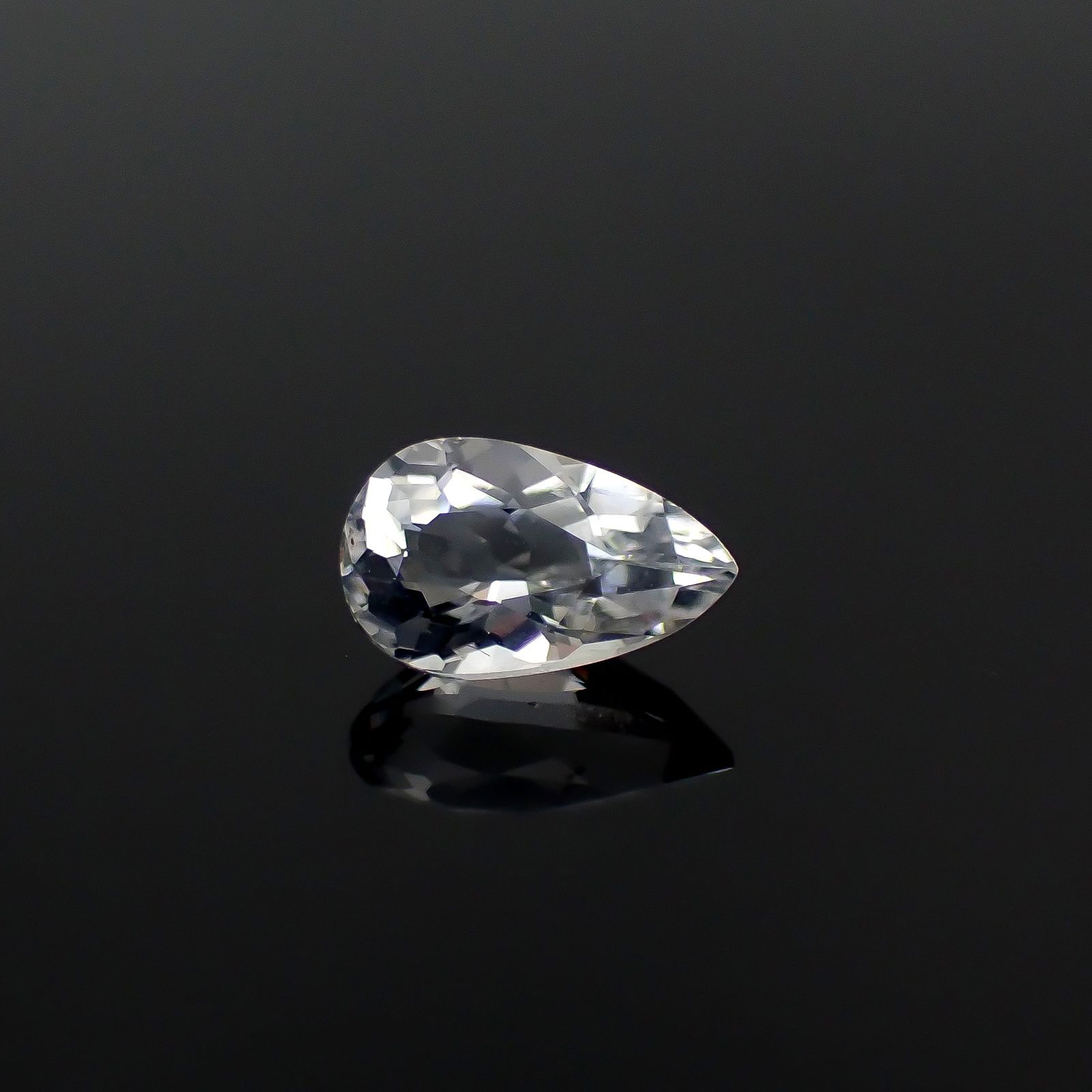 テネブレッセンススキャポライト アフガニスタン産 0.49ct / 7x4.3mm前後 [251218569]