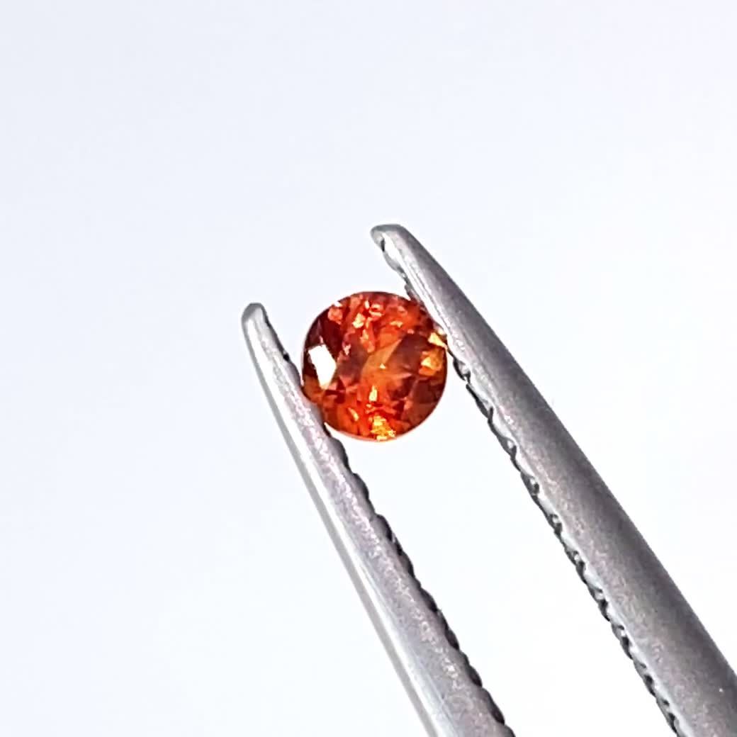 オレンジロードクロサイト 南アフリカ産 0.13ct[230321029]2.8x2.7mm