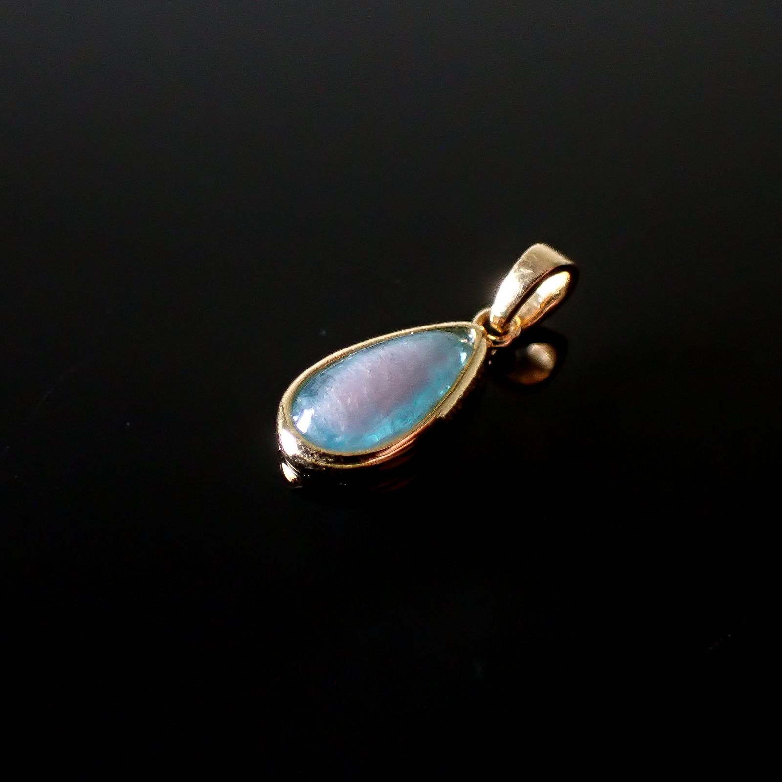◇K18ペンダント◇ バイカラーパライバトルマリン ブラジル・バターリャ鉱山産 0.60ct | 手巻き枠 つやあり 5.4x9mm(※チェーン別売り) [241229431]