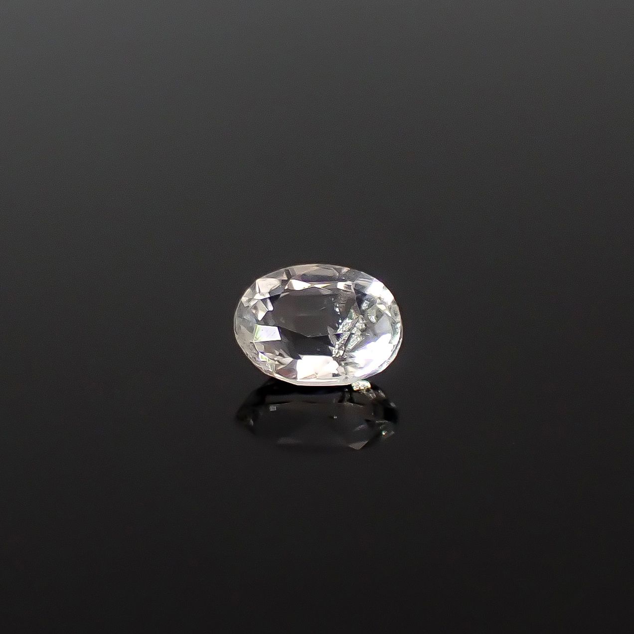 テネブレッセンススキャポライト アフガニスタン産 0.25ct / 4.7x3.6mm前後 [260432044]