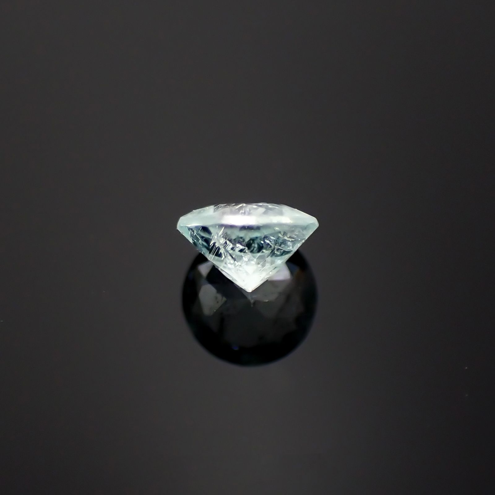 パライバトルマリン(宝石名トルマリン/別名パライバ・トルマリン)モザンビーク産 0.15ct 識別済[230220441]3.5x3.4mm前後