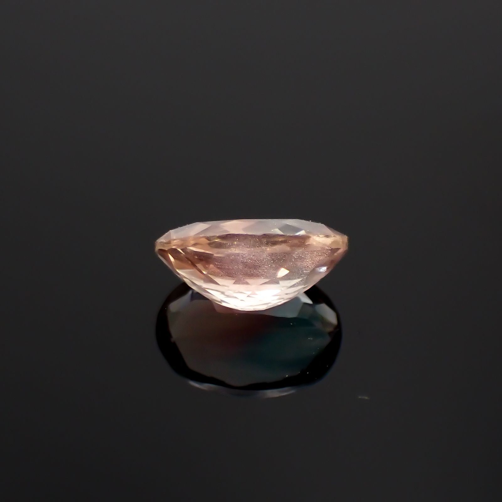 パーティカラーオレゴンサンストーン アメリカ・オレゴン州産 0.93ct[230722847]7.8x5.7mm前後