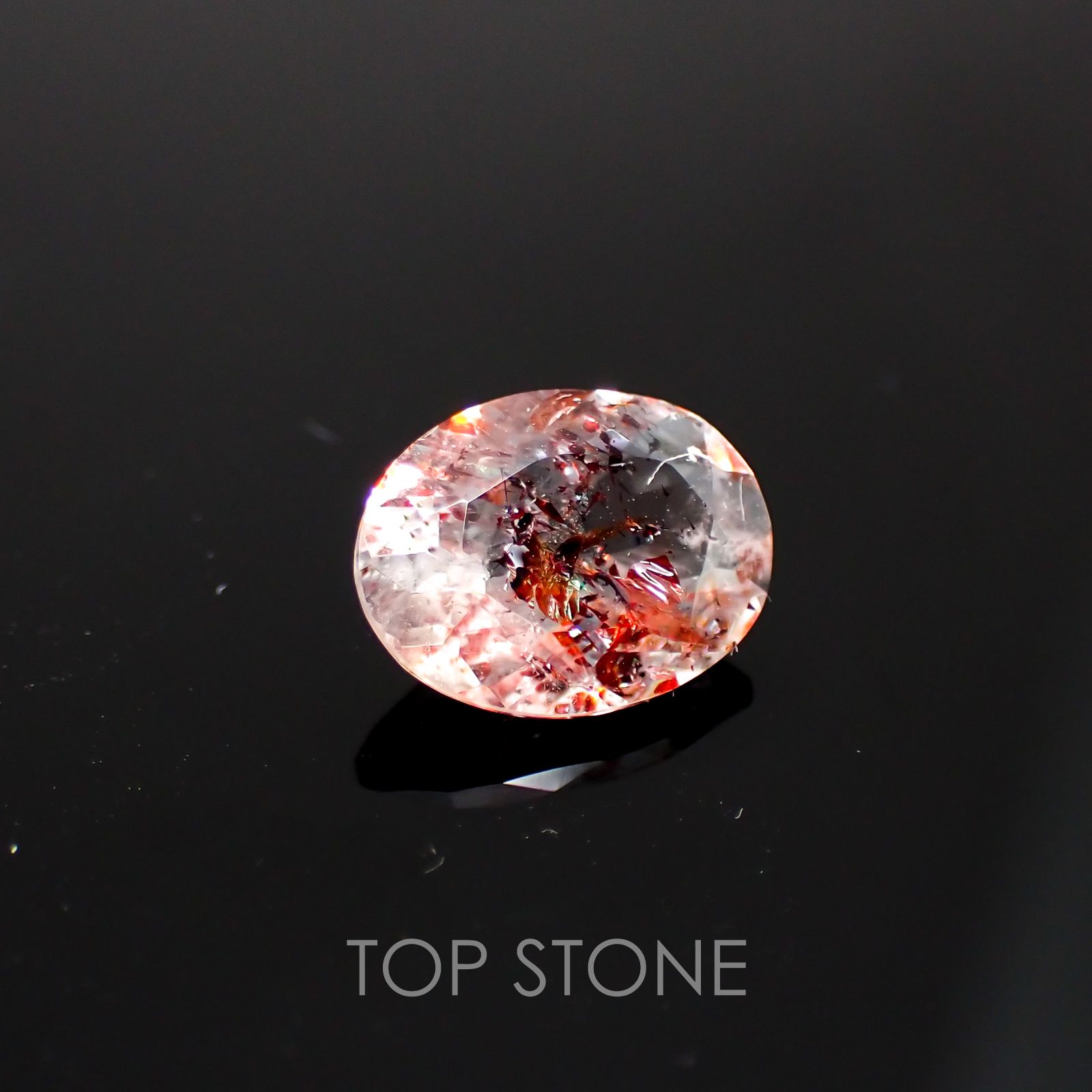 ファイヤークォーツ ナイジェリア産 ルース 1.47ct[210410204]9.1×6.9mm前後