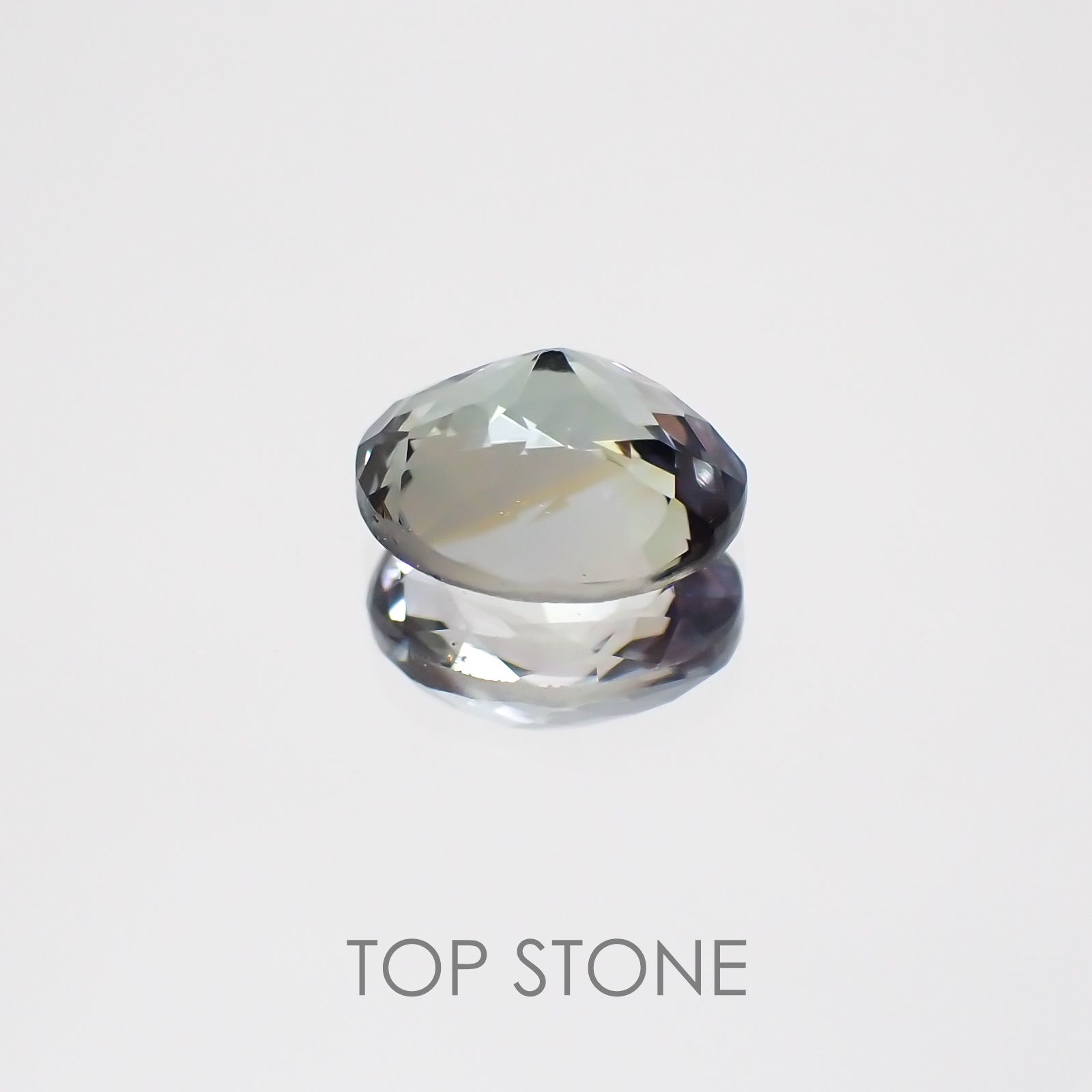 パーティカラータンザナイト(宝石名パーティカラード・ゾイサイト) タンザニア産 1.382ct ソ付(彩珠)[20074303]7.5×6.2mm前後