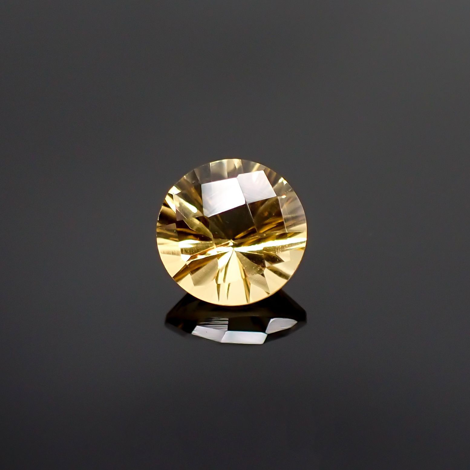 ◇チェッカーコンケーブカット◇シトリン(宝石名シトリン) ブラジル産 識別済 1.14ct / 7.1×7.1mm前後 [251013027]