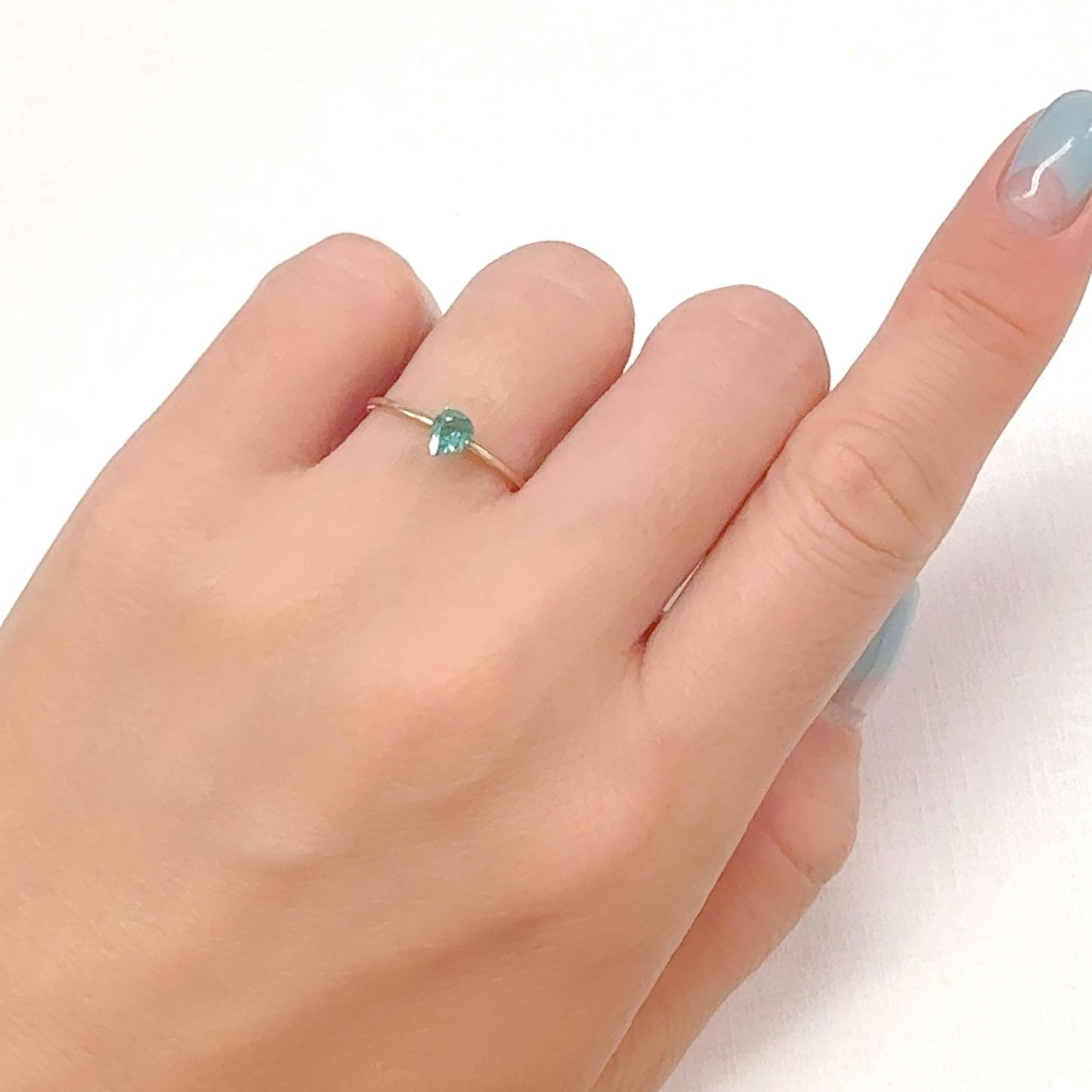 パライバトルマリン(宝石名トルマリン/別名パライバ・トルマリン)ブラジル・パライバ州バターリャ鉱山産 0.268ct ソ付(宝貴協)[240928742]4.9x3.98mm前後
