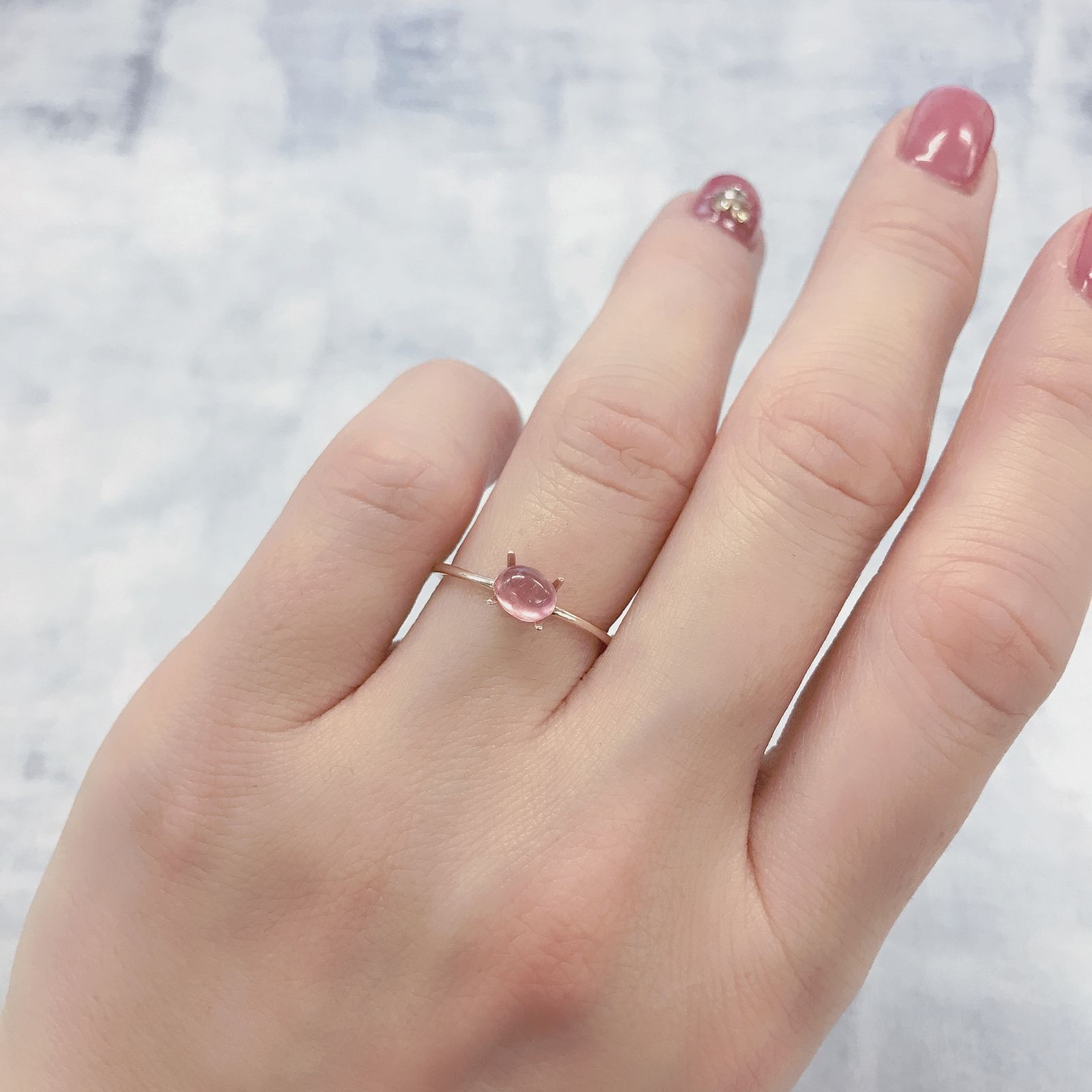 ペツォッタイトキャッツアイ(ラズベリル)(宝石名ペツォッタイト・キャッツアイ)マダガスカル産 0.575ct ソ付(彩珠)[220114350]5.3x4.3mm前後