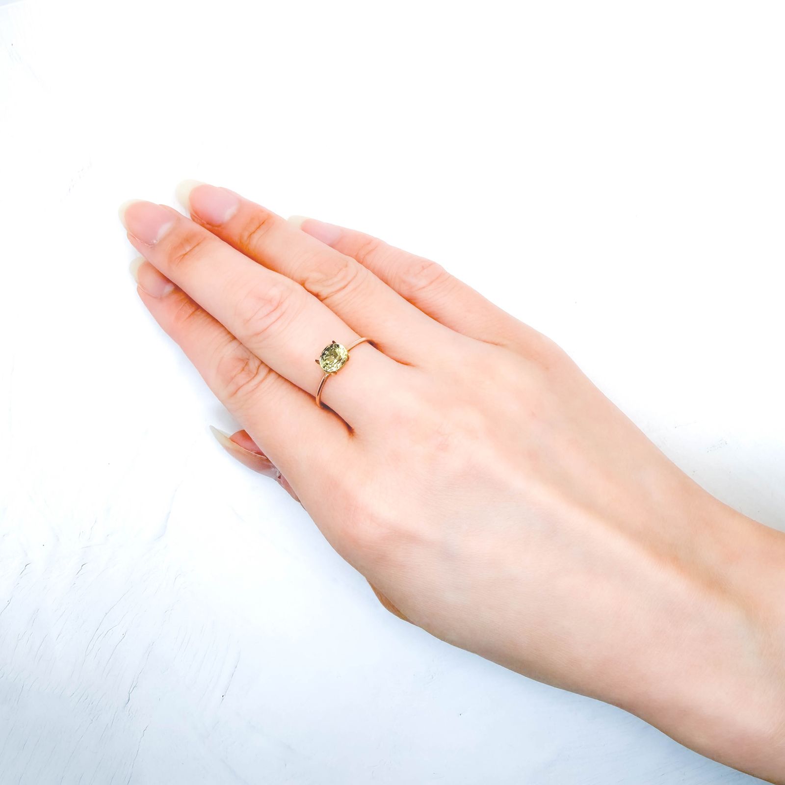 イエローアパタイト メキシコ産 1.00ct / 6.1x5.2mm前後 [260632466]