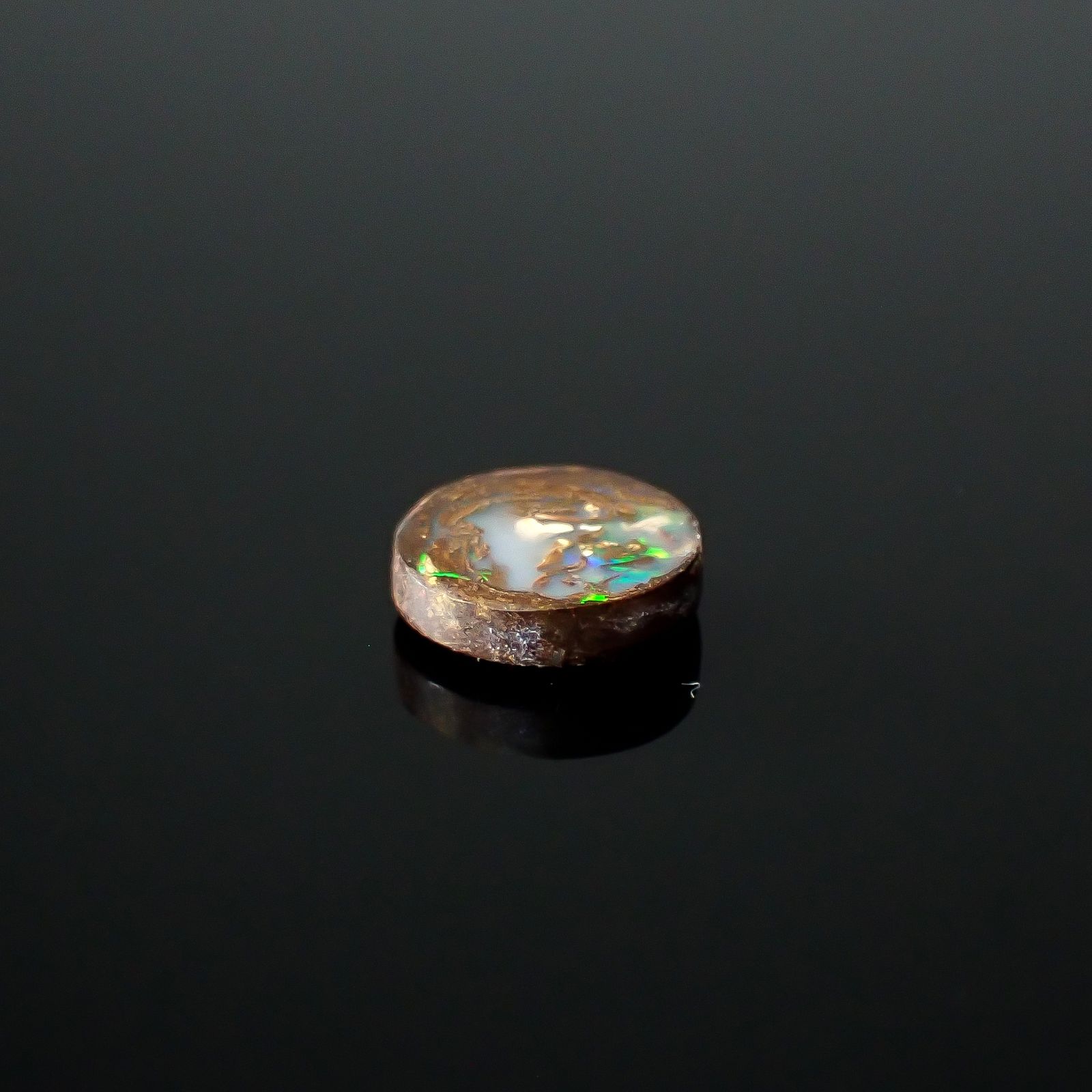 ウッドオパール オーストラリア産 0.94ct / 7.6x7.6mm前後 [251031194]