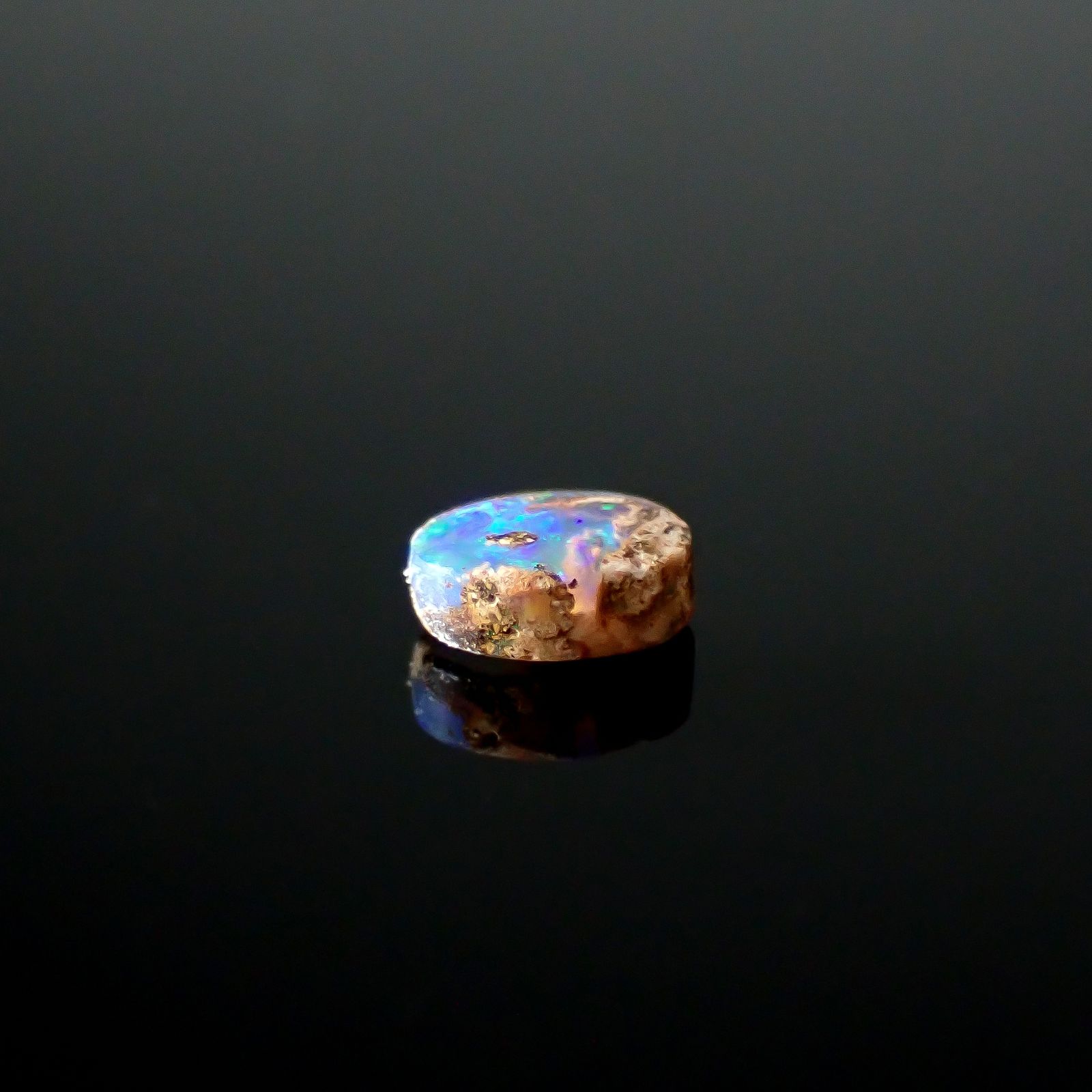 ウッドオパール オーストラリア産 0.24ct / 4.8x3.6mm前後 [251031199]