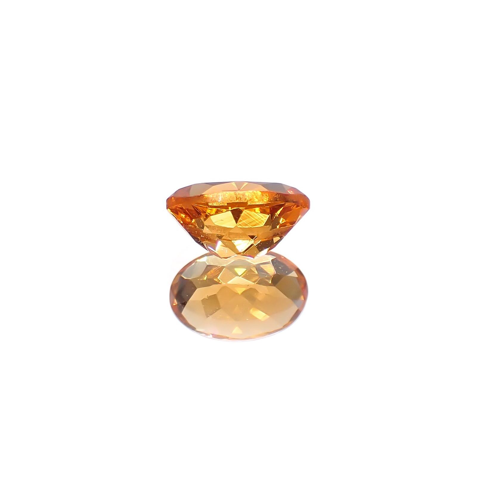 スペサルティンガーネット(宝石名ガーネット)タンザニア産 識別済 0.72ct / 6.1x4.1mm前後 [260617549]