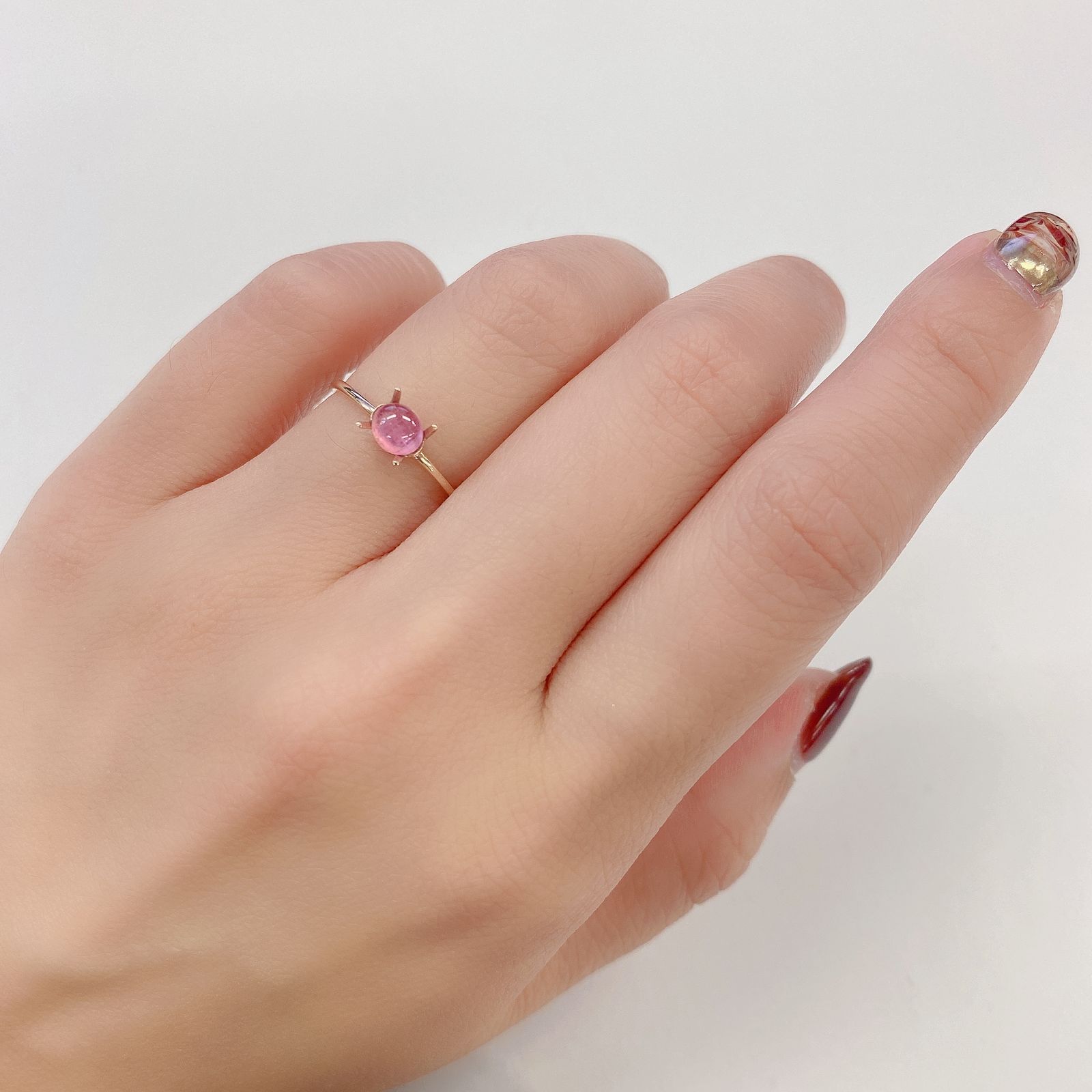 ペツォッタイトキャッツアイ(ラズベリル)(宝石名ペツォッタイト・キャッツアイ) マダガスカル産 0.481ct ソ付(彩珠)[210811977]5×4mm前後
