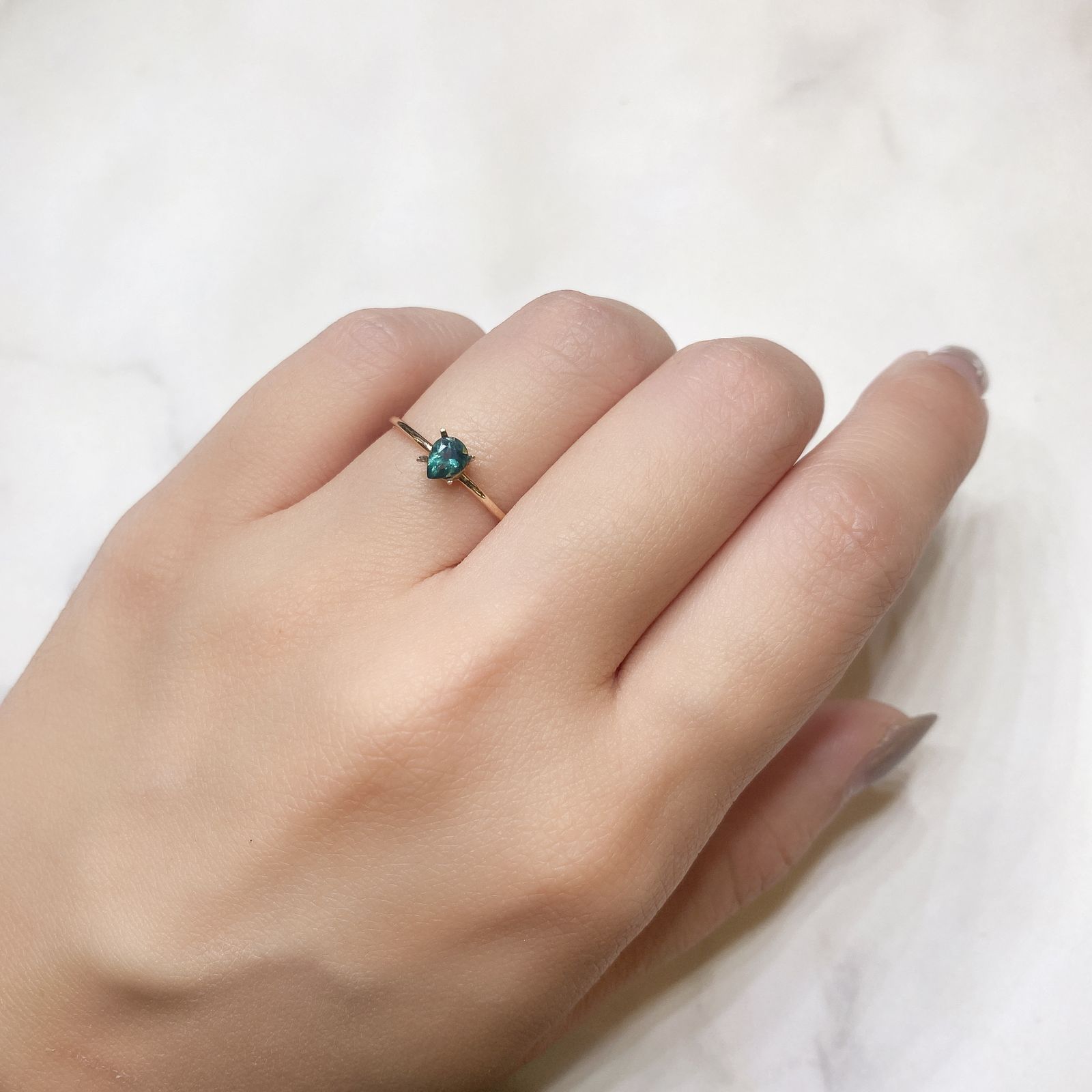 グリーンアパタイト(ノーブルモロキサイト)(宝石名アパタイト) マダガスカル産 0.25ct 識別済[211013539]4.8×3.7mm前後